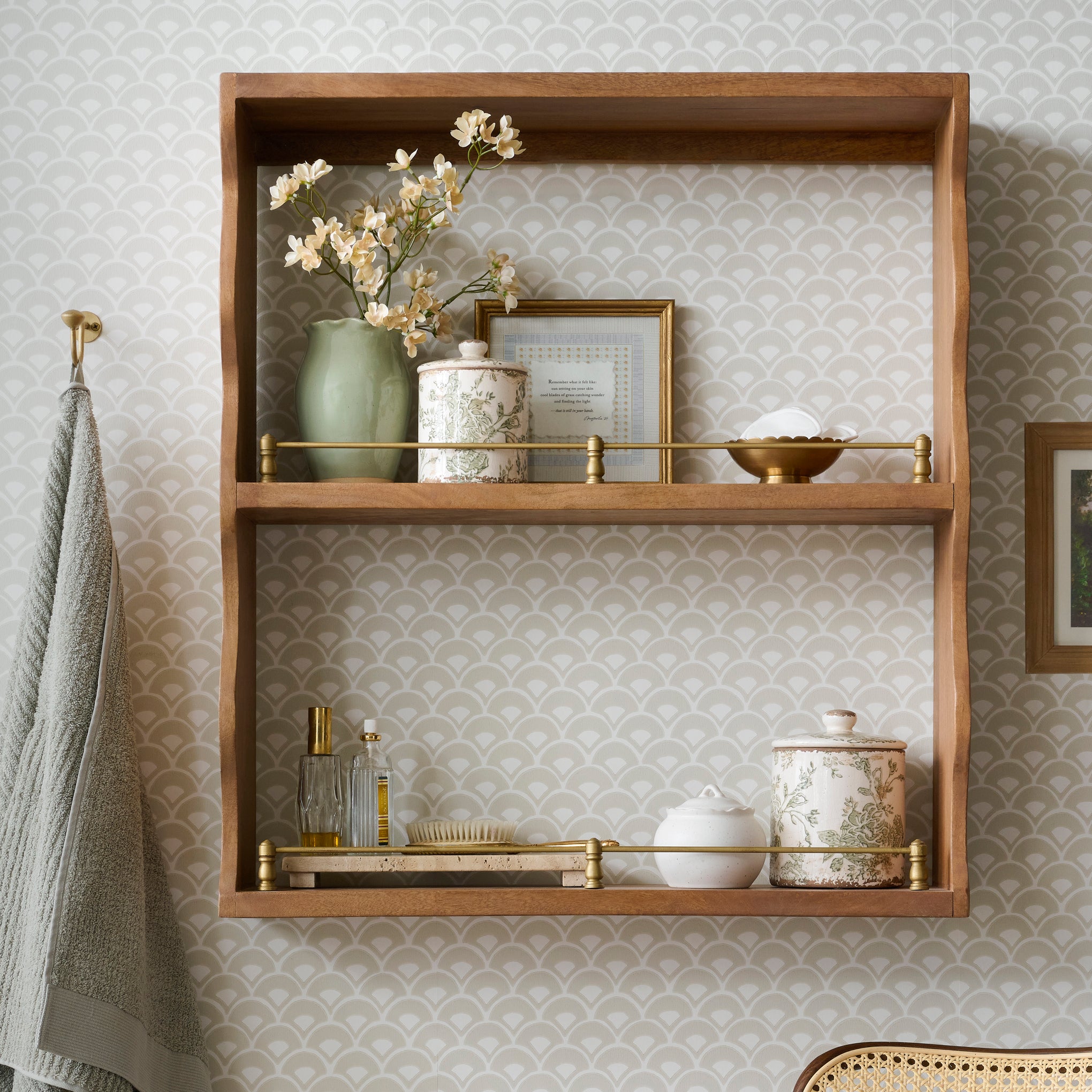 Faye Scallop Shelf with Brass Rails with canisters and decor on shelves 