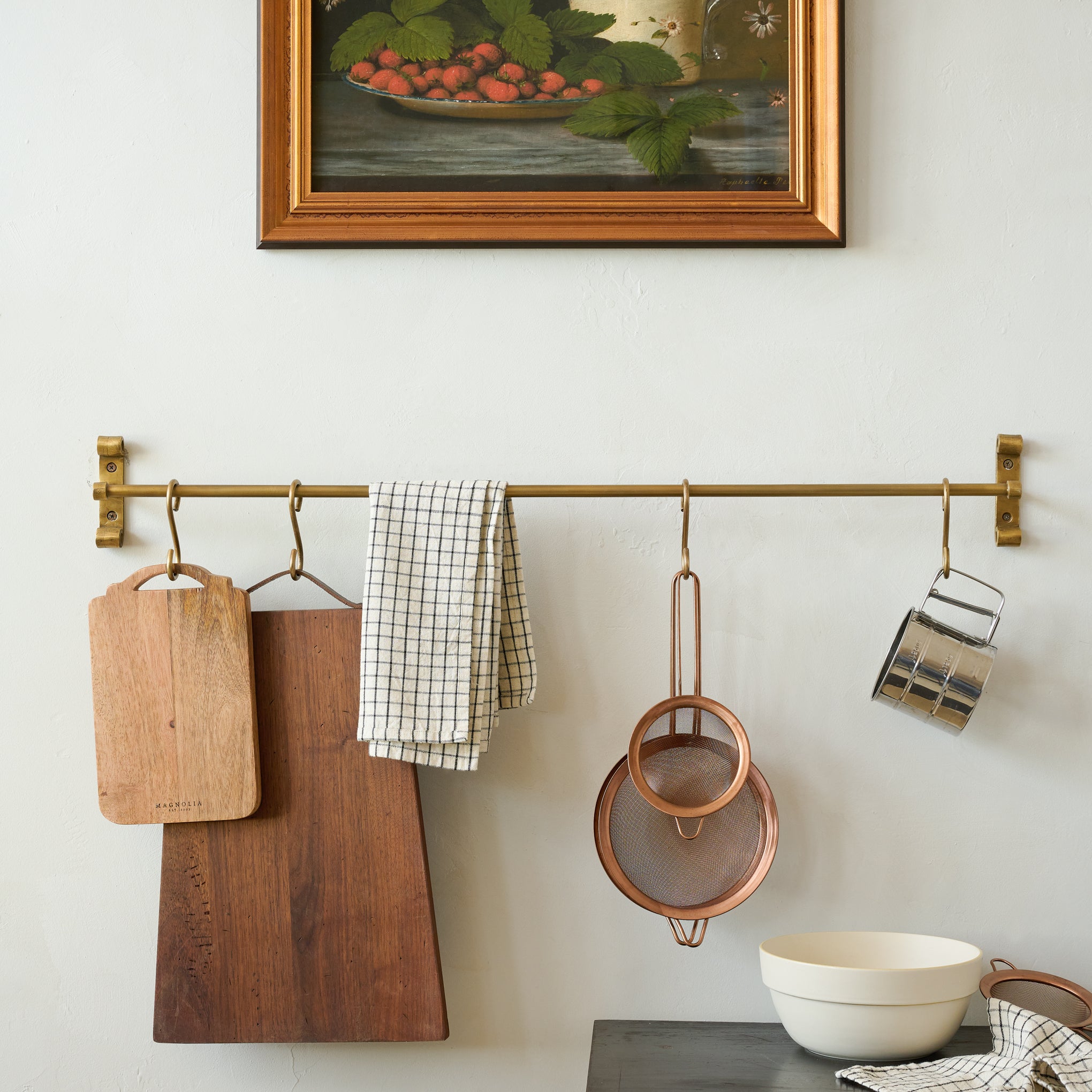 Duke Brass Rail with Hooks with kitchen items hanging on hooks
