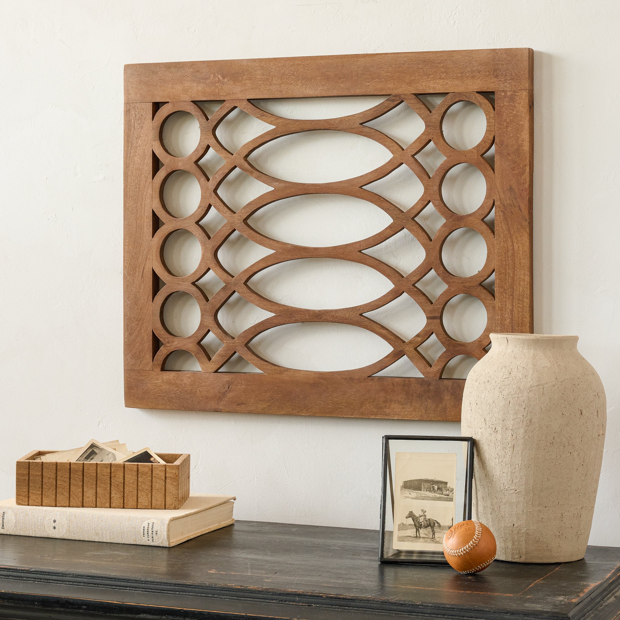 Morgan Antiqued Wood Wall Pane on a wall above a dresser $88.00