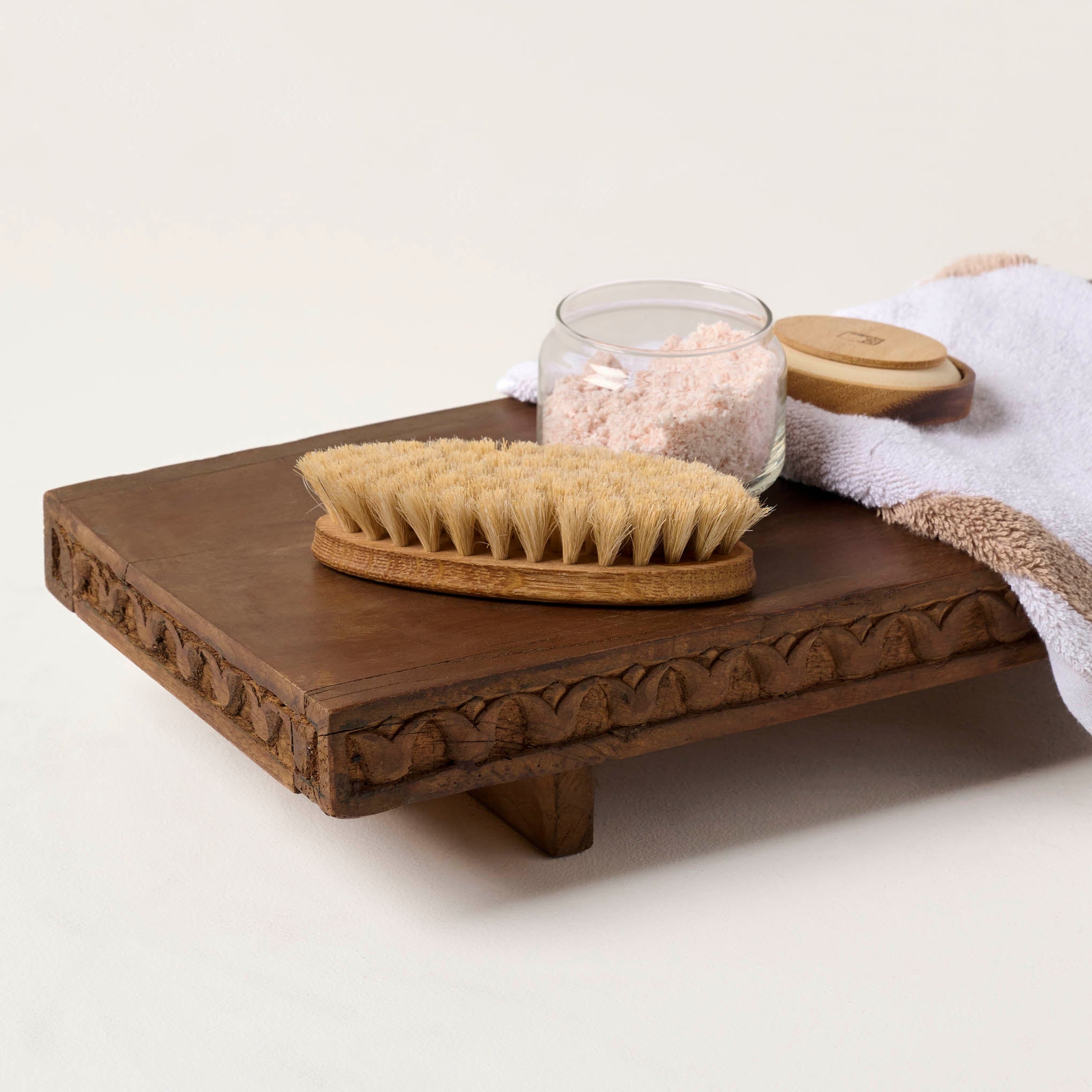 Reclaimed Wood Bath Tray shown with bath accessories on top