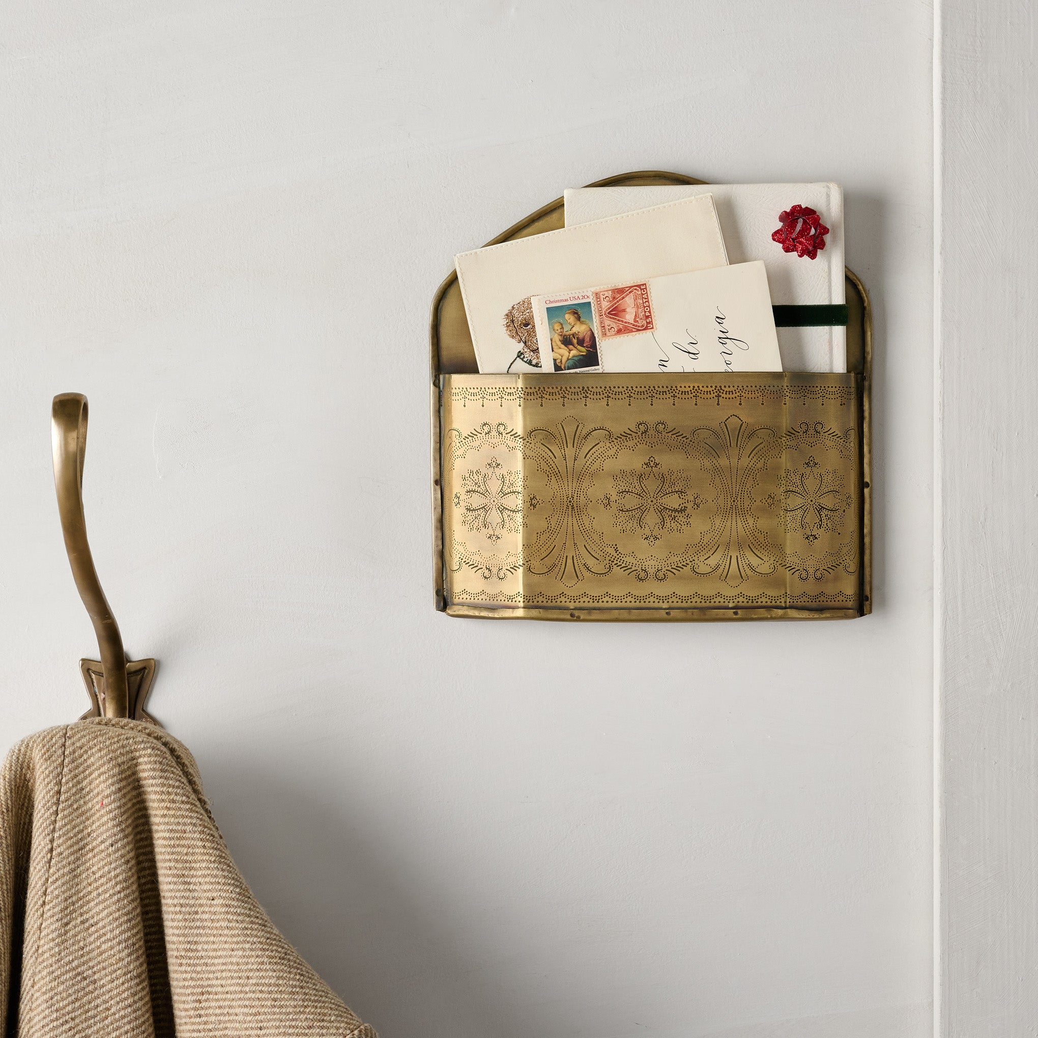 Etched Brass Wall Card Holder shown holding mail