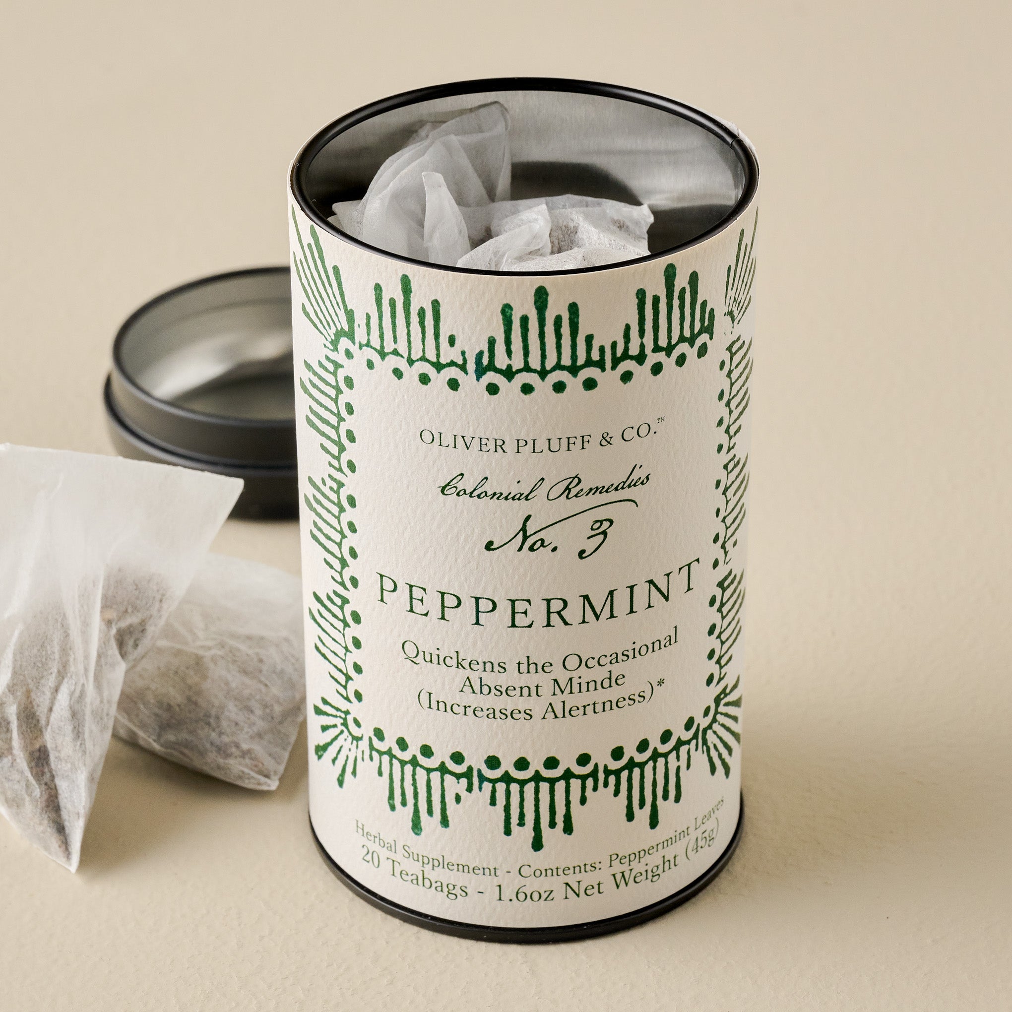 Oliver Pluff & Co. Peppermint Tea tin shown open with tea bags