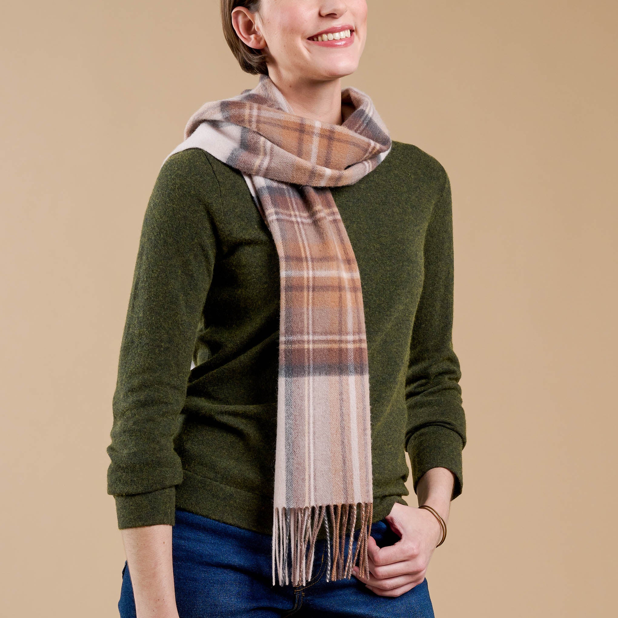 Natural Tartan Lambswool Oversized Scarf on model On sale for $48.00, discounted from $60.00