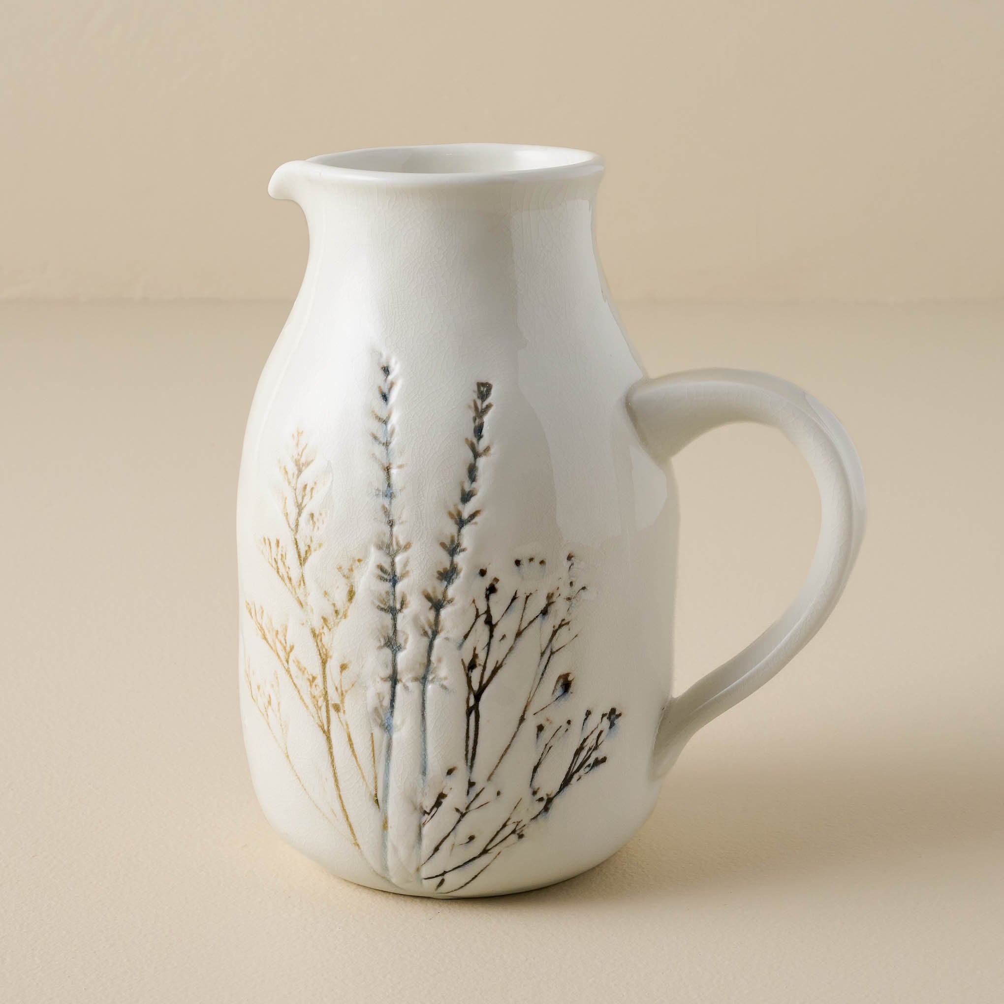 Pressed Floral Ceramic Pitcher $30.00