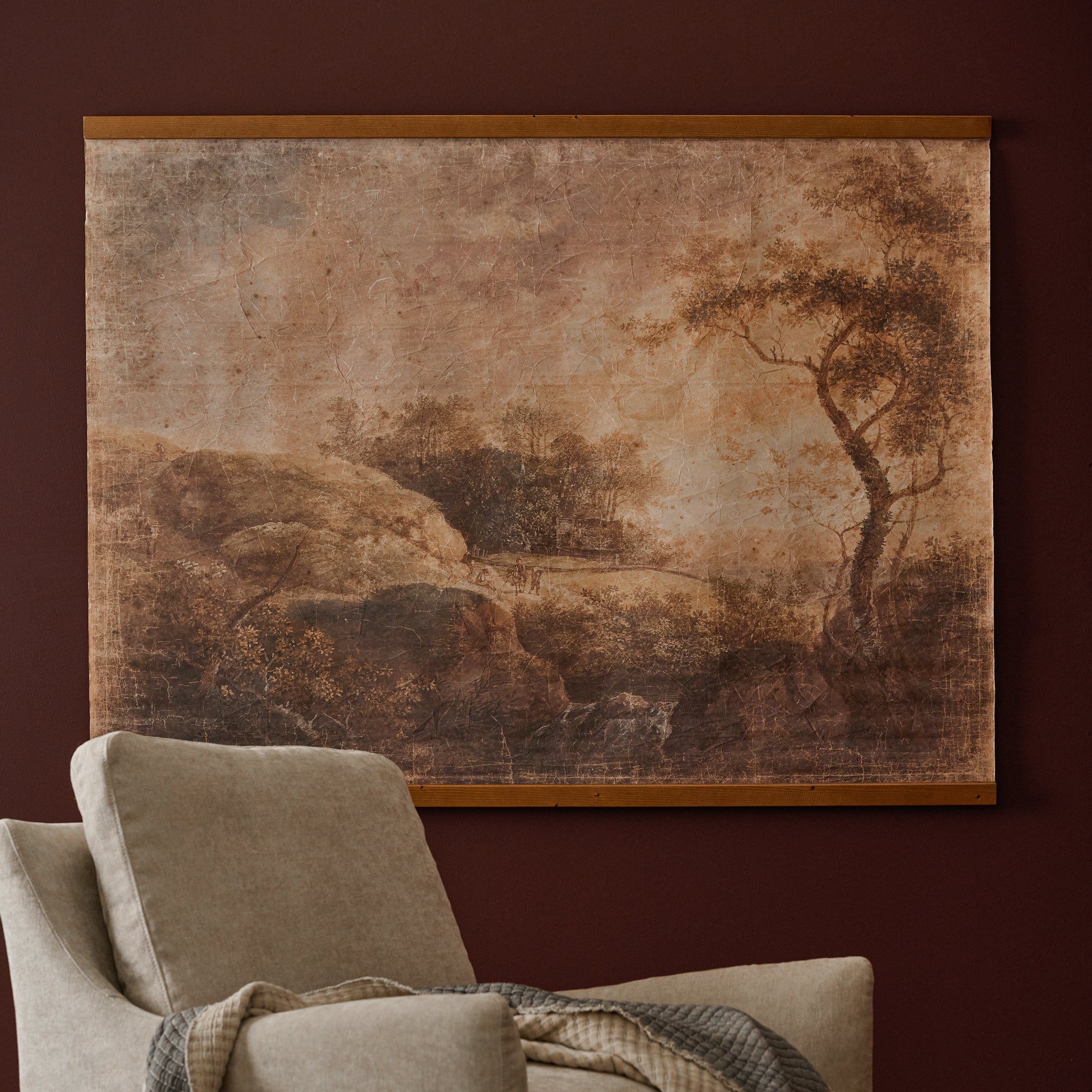 Rolling Hills Tapestry hung on a maroon wall