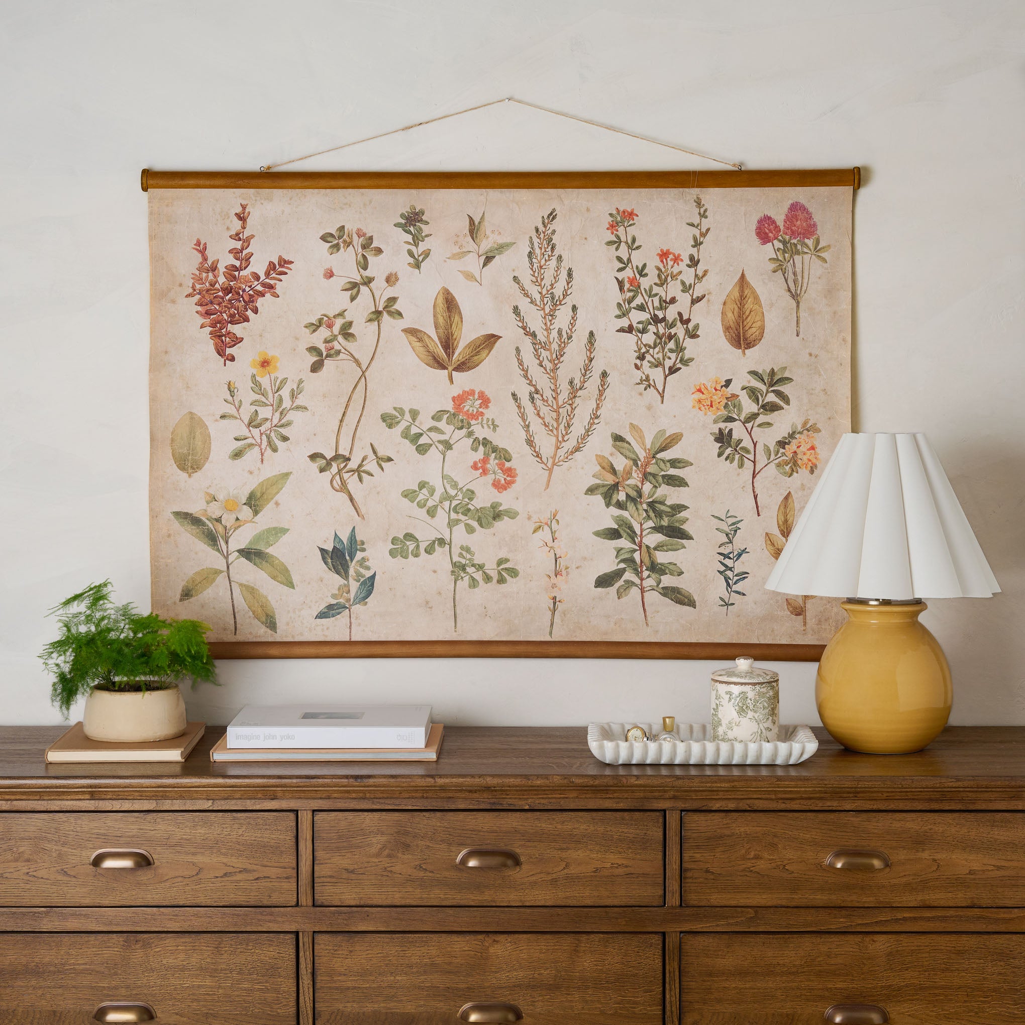 Botanical Study Tapestry hanging above a dresser