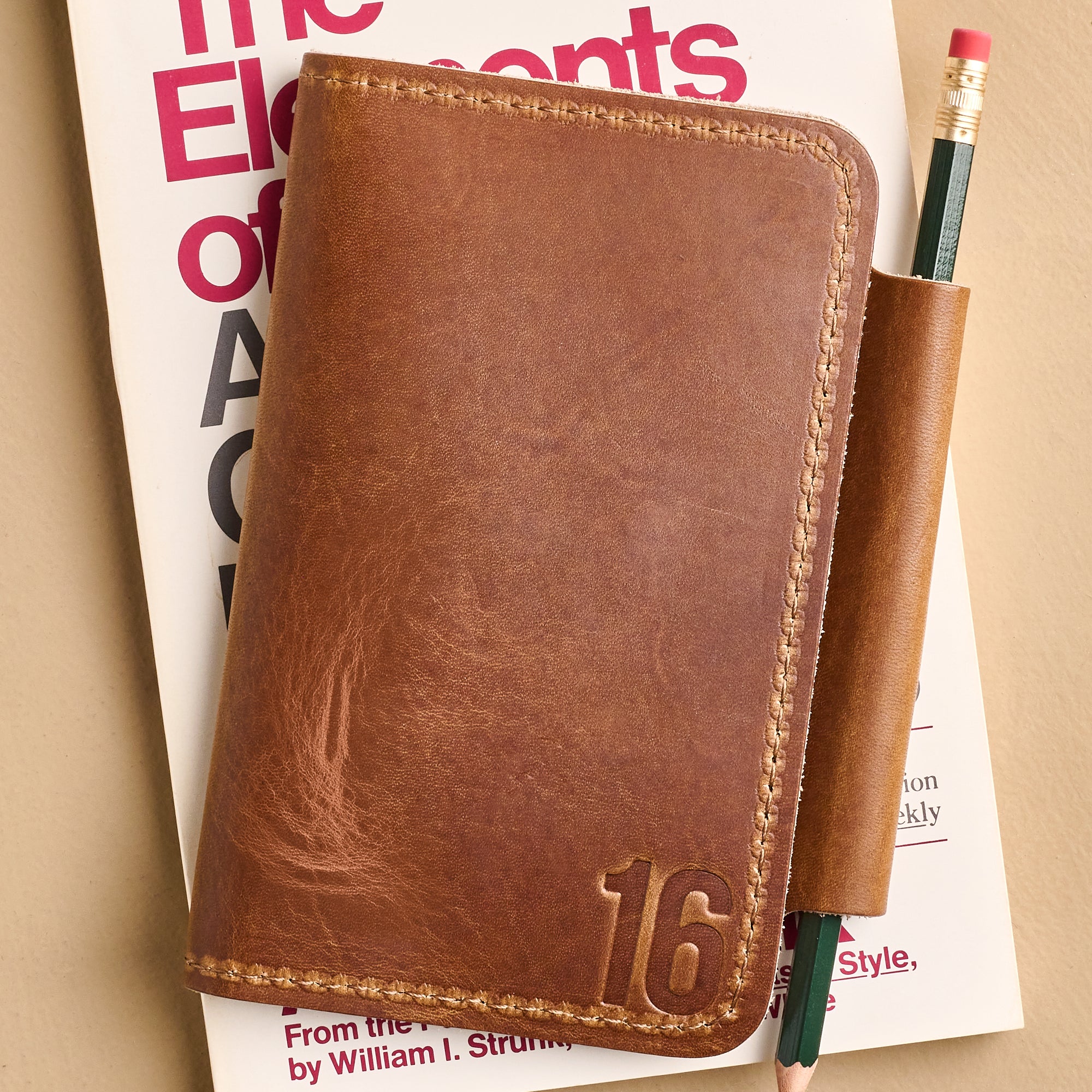 Magnolia Debossed Number 16 Leather Field Guide Folio $60.00