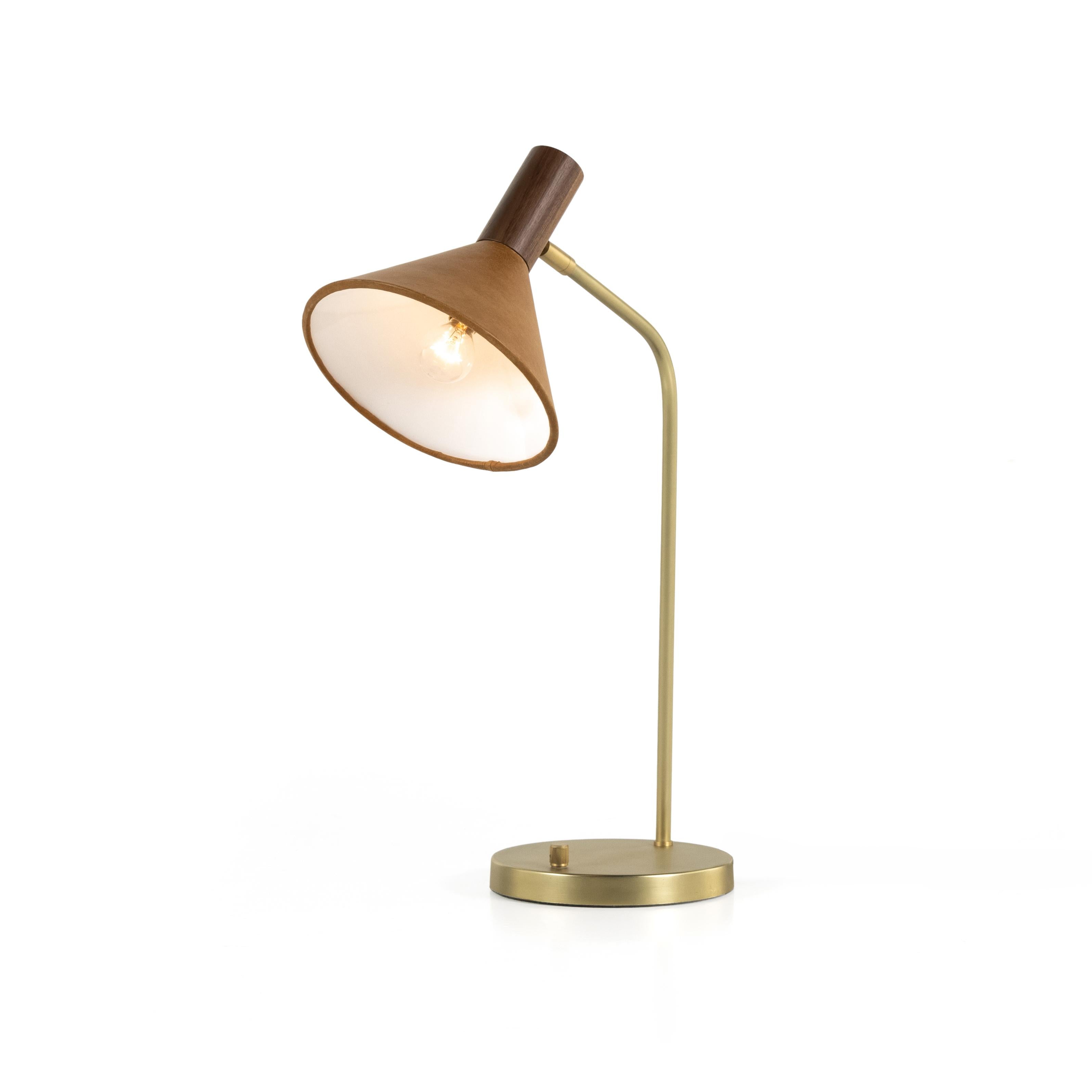 Gibson Task Lamp with Leather Shade in caramel leather with light on