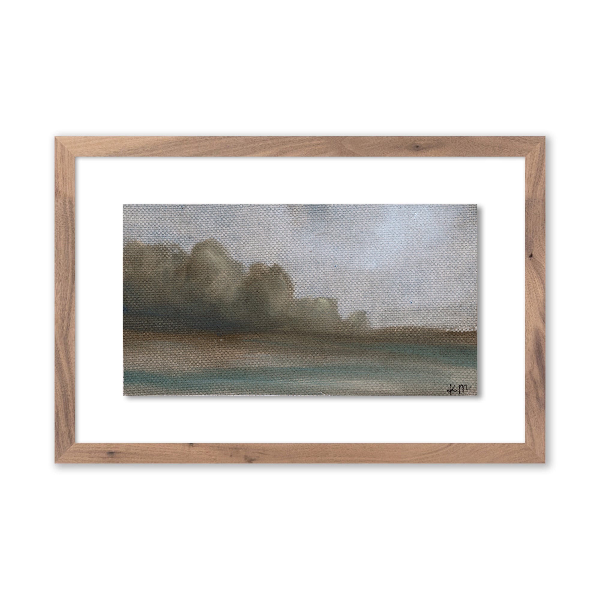 Framed art called The Space Between II by Katie Mulder shows open skies and rolling hills in muted colors