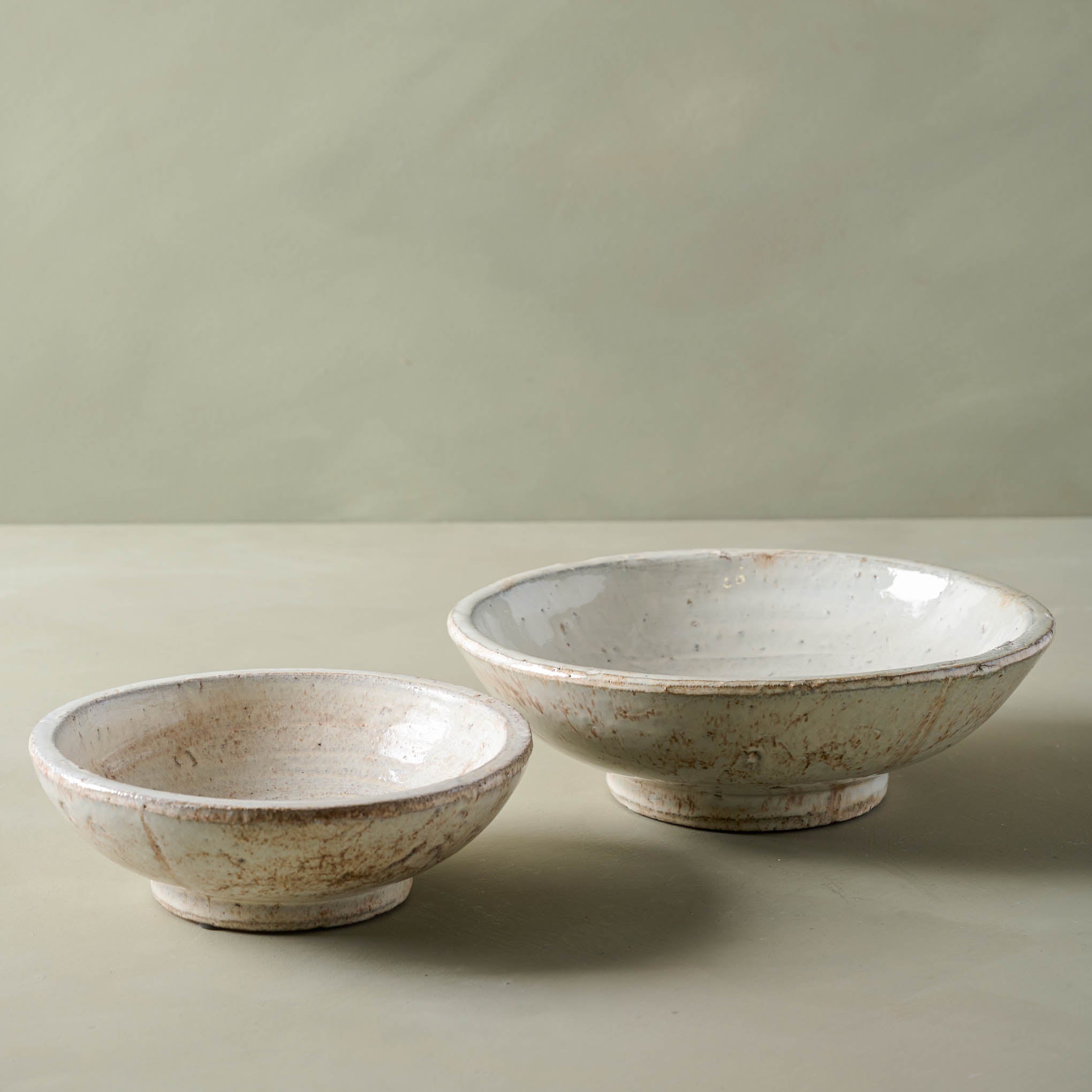 Large and small sizes of rustic cream accent bowl Items range from $16.00 to $30.00