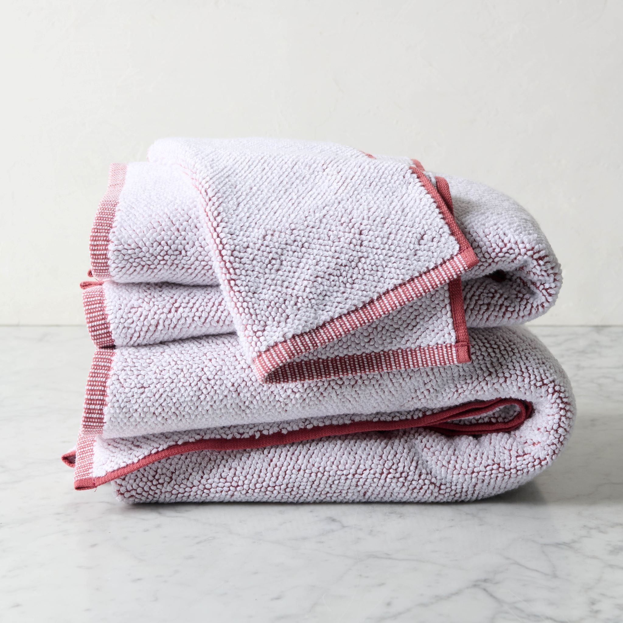 Rust Assisi Textured Towel On sale for $9.60, discounted from $12.00