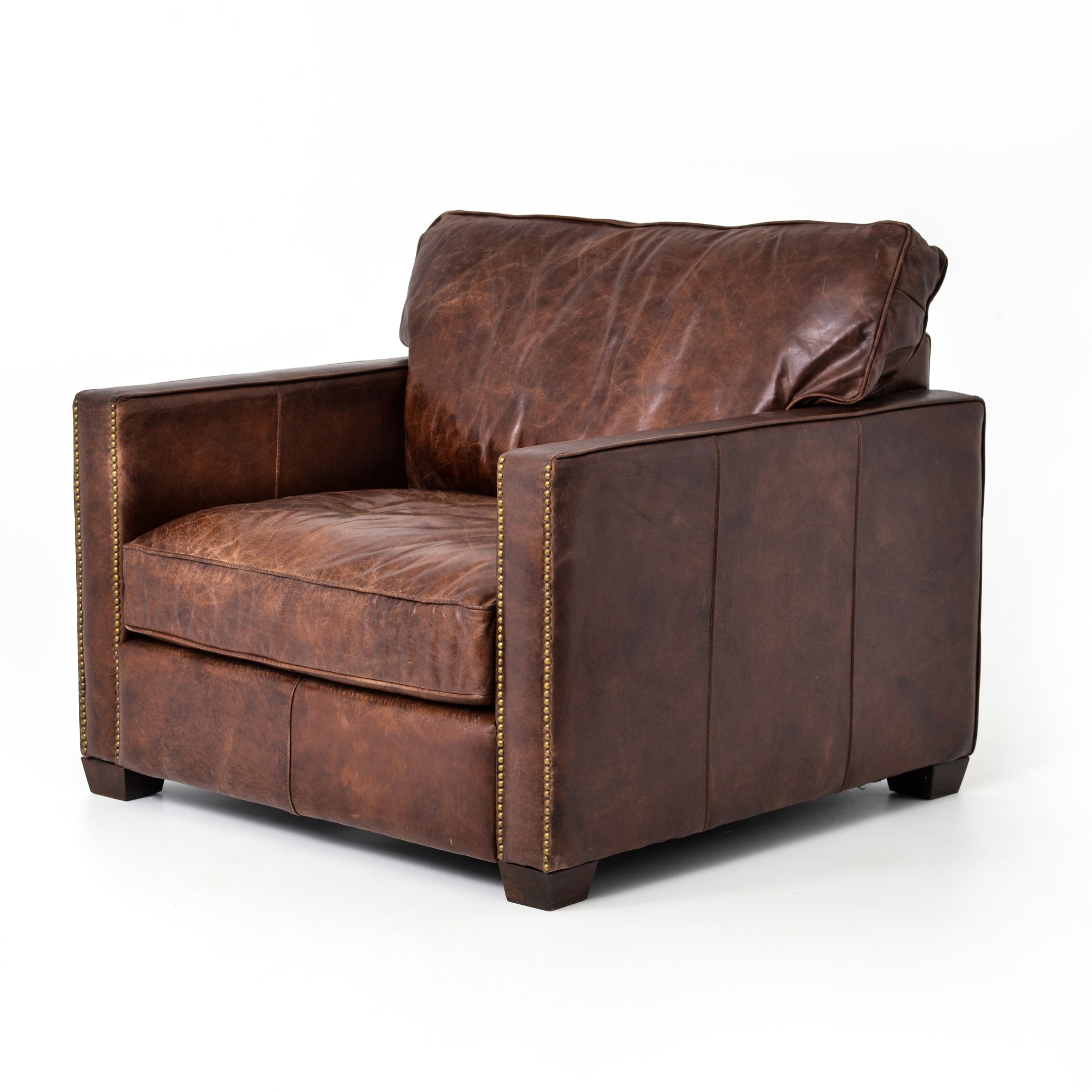 medium brown leather arm chair with nailhead arms $2899.00