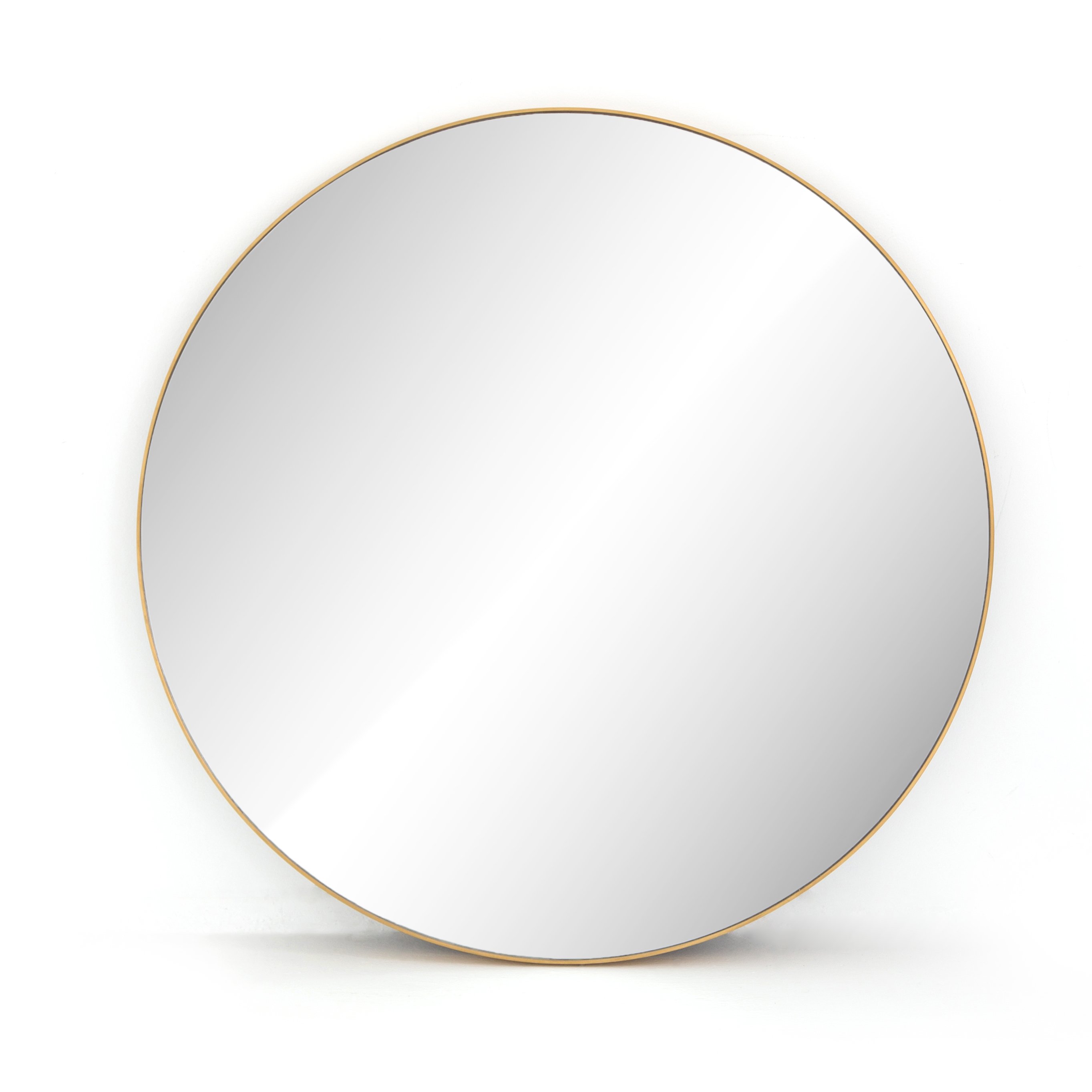 large brass framed round mirror