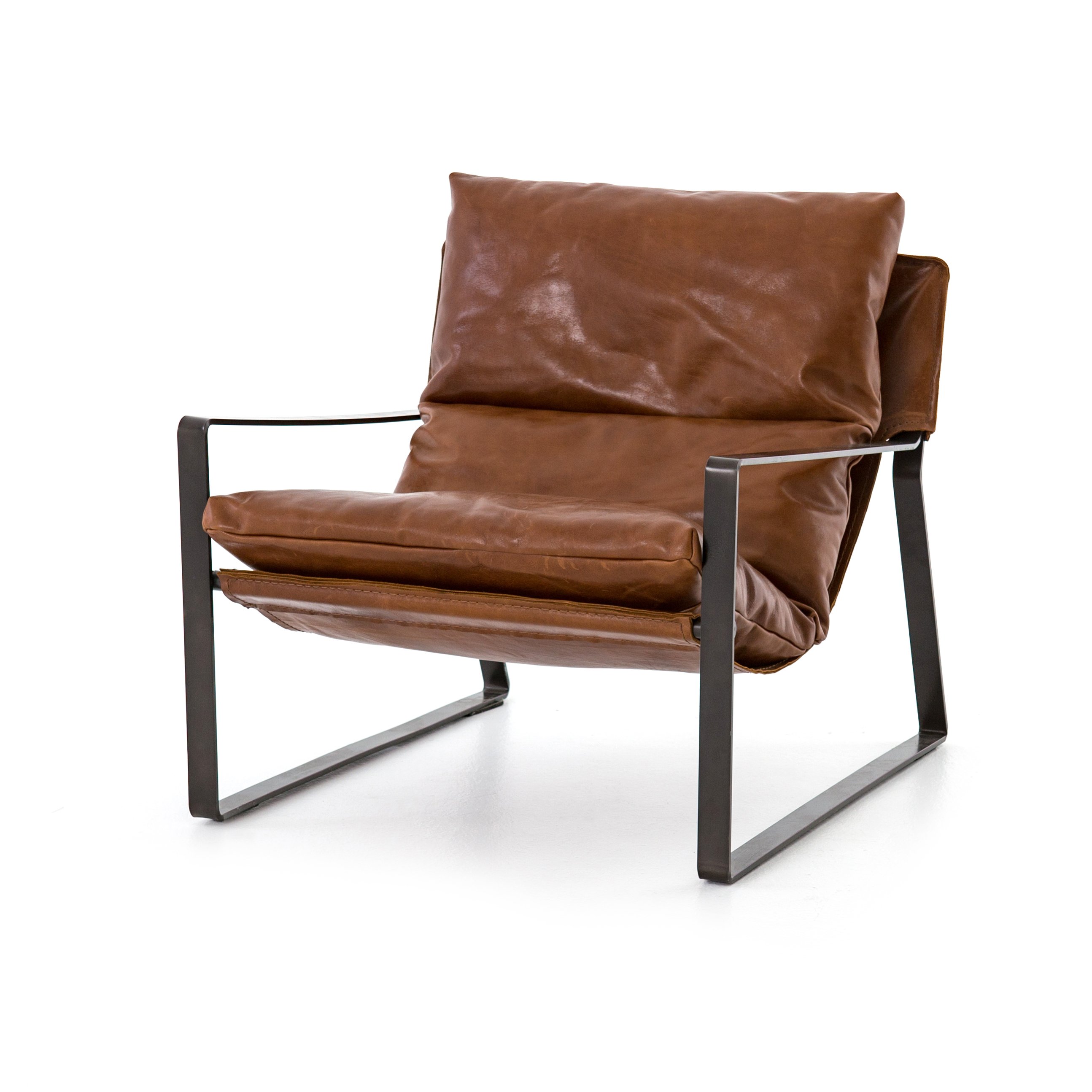 magnolia modern bodie sling chair with black metal frame Items range from $1599.00 to $2099.00