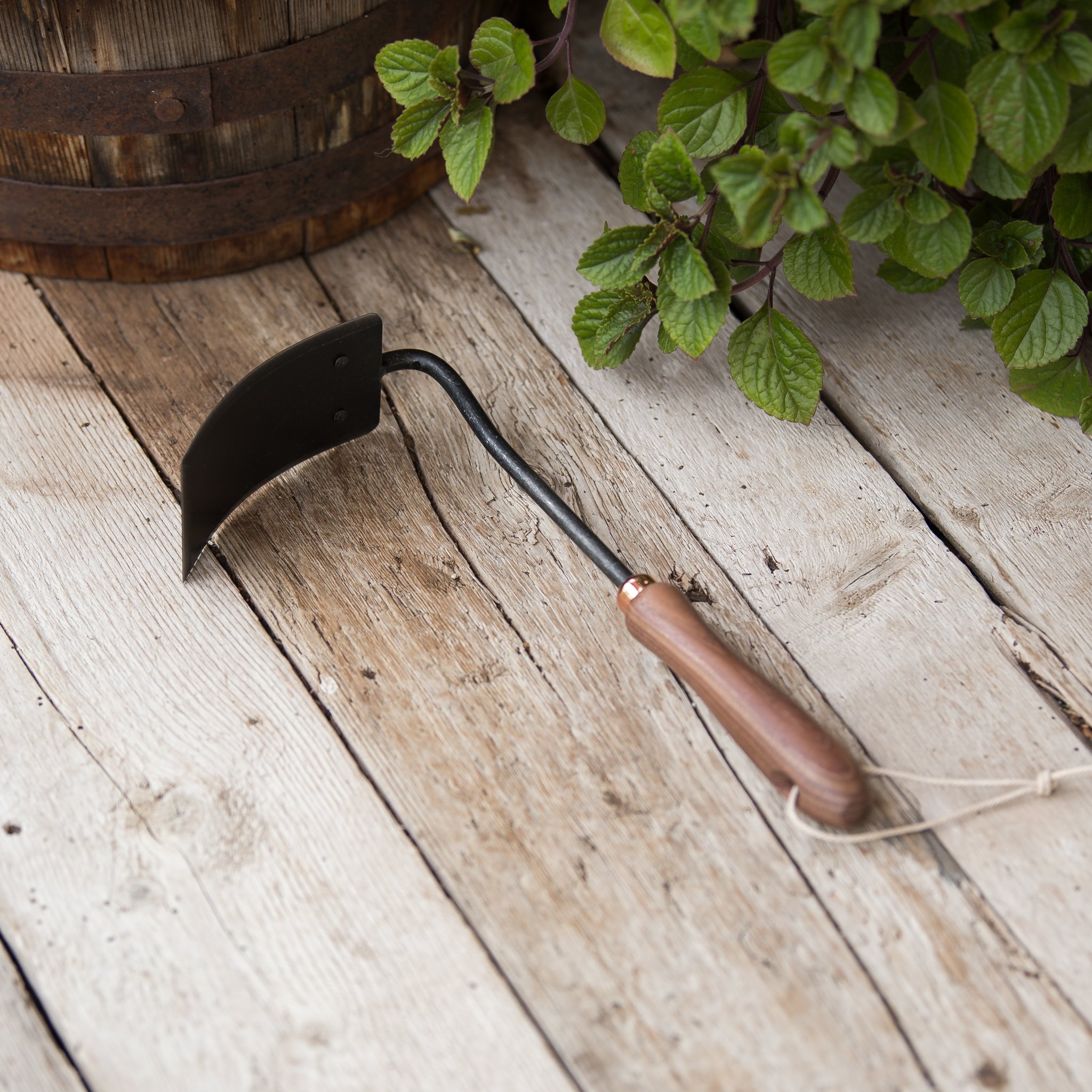 black metal square gardening hoe with wooden handle