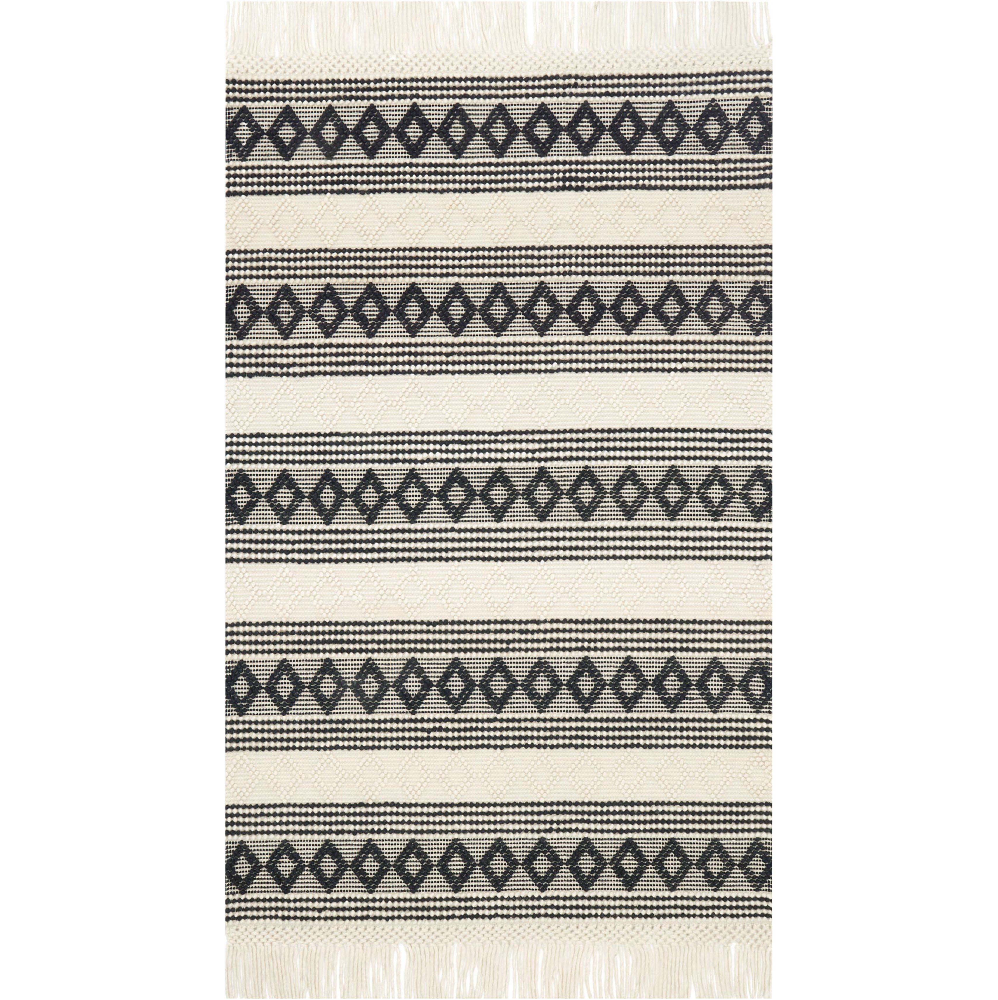 modern black and white diamond pattern rug with white tassels