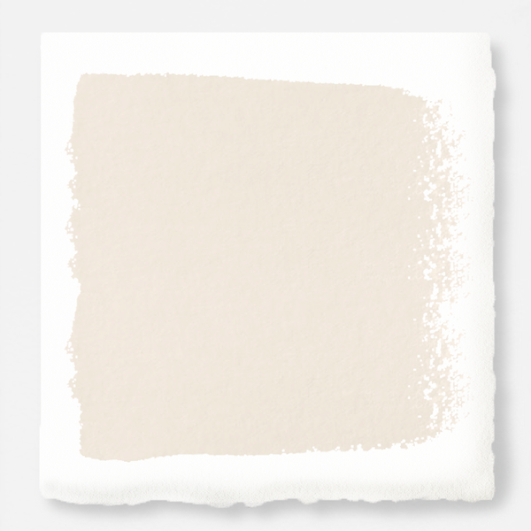 An ivory shade dusted with pink and yellow chalk style paint