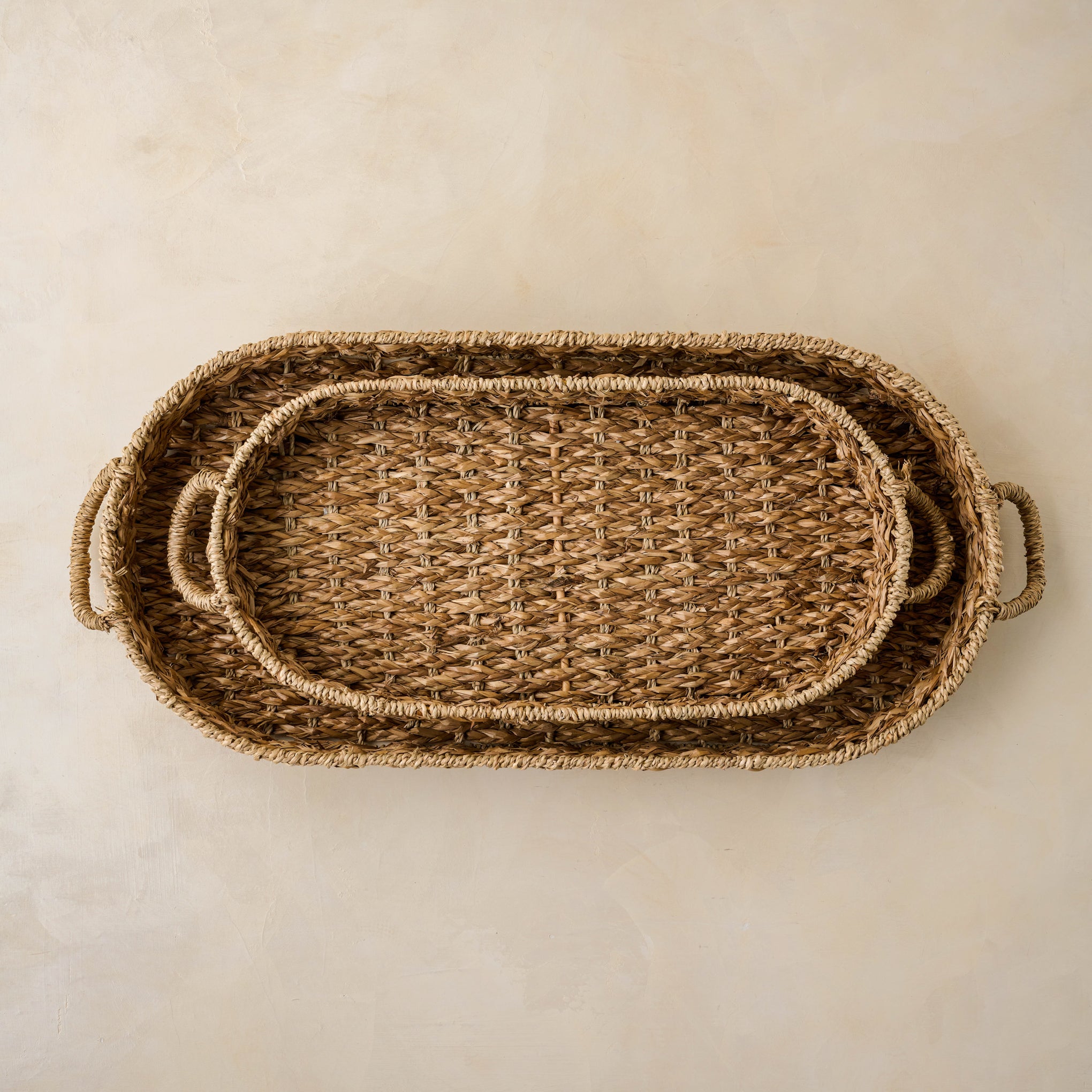 Woven Pill-Shaped Tray stacked inside one another