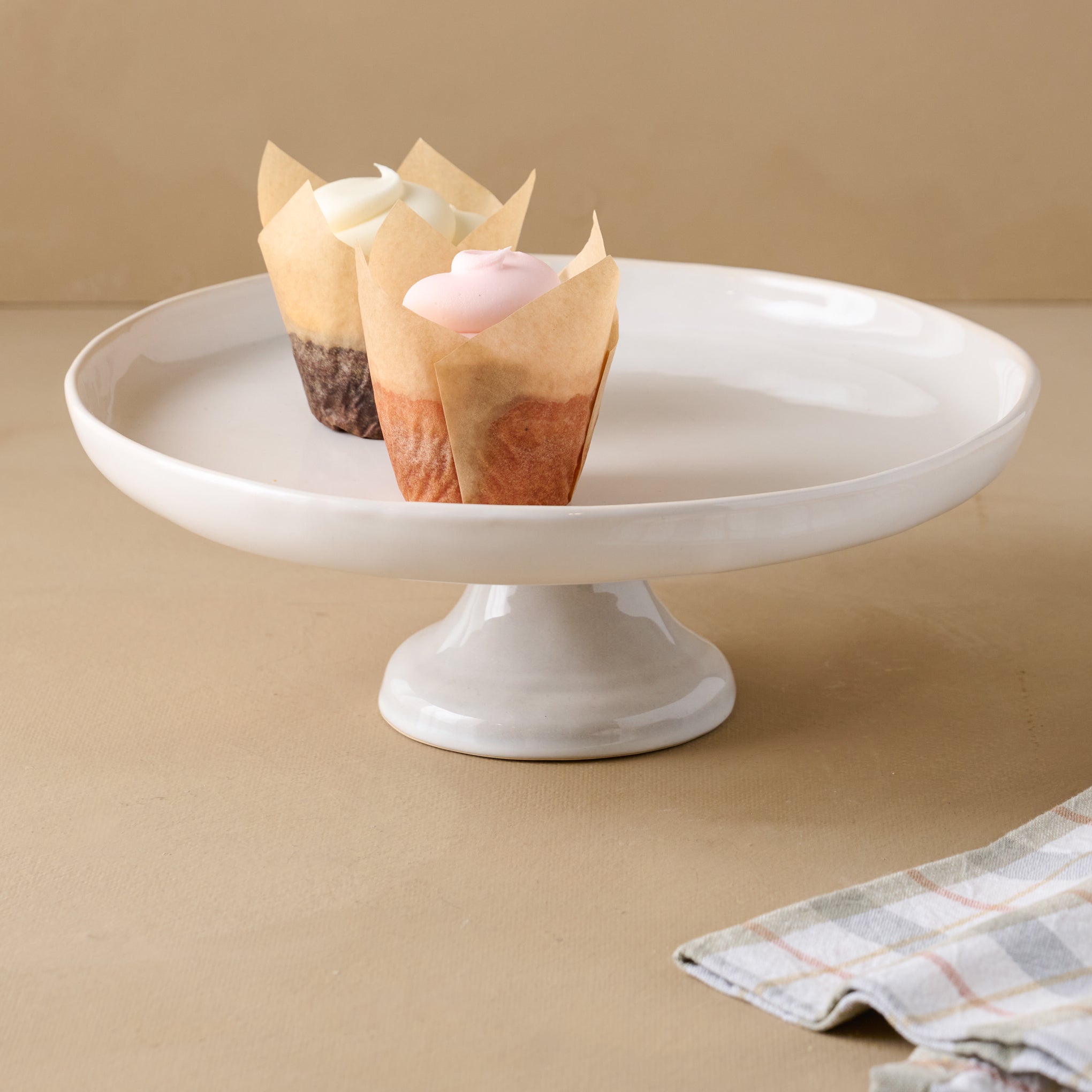 Magnolia Est. Cake Stand with silos baking co. cupcakes on top $42.00