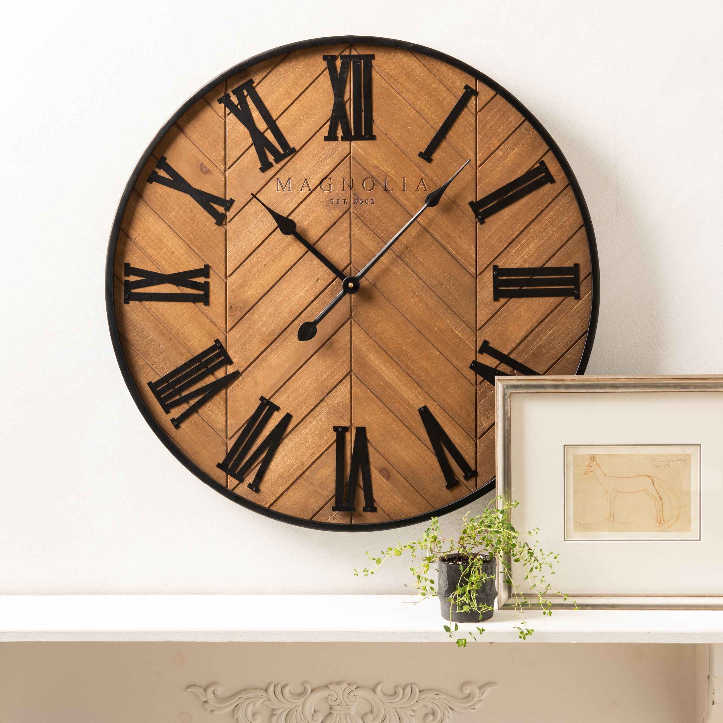 Delia Wooden Roman Numeral Wall Clock with herringbone designOn sale for $98.00, discounted from $148.00