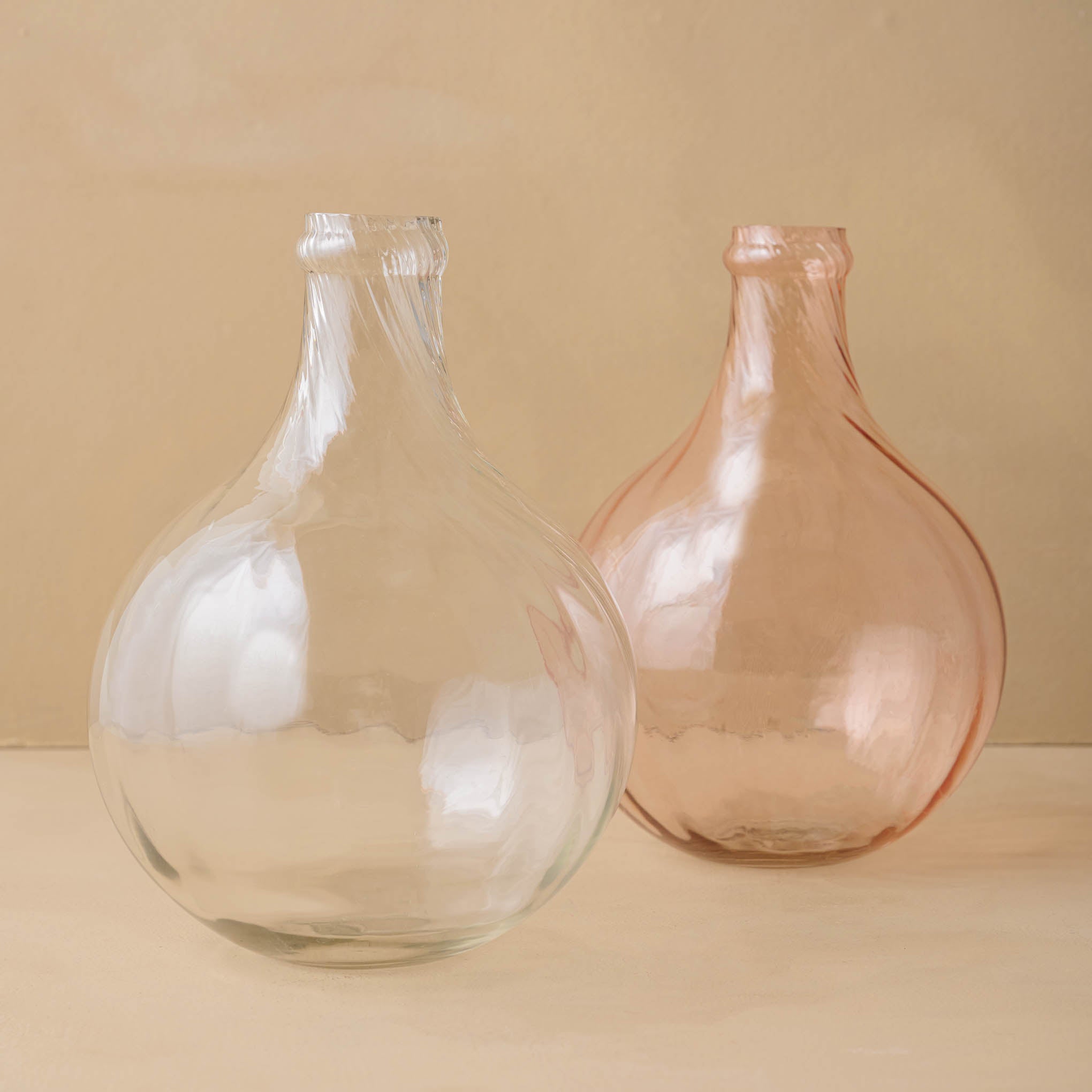Penelope Fluted glass Vases in peach and clear On sale for $19.20, discounted from $32.00