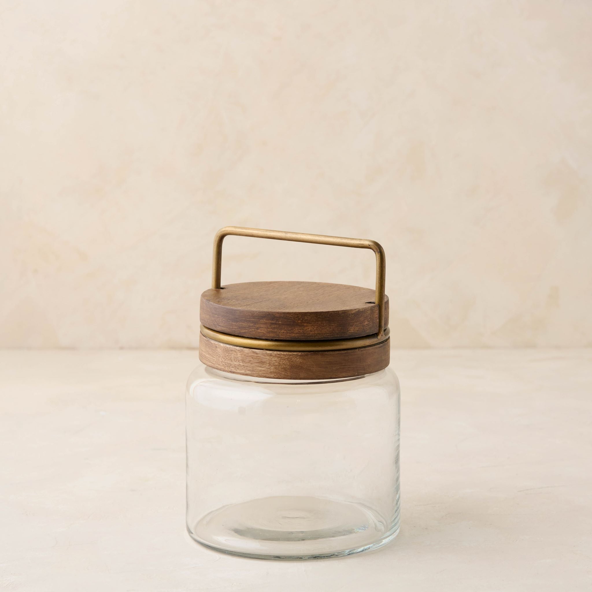 magnolia glass canister with wood and antique brass lid