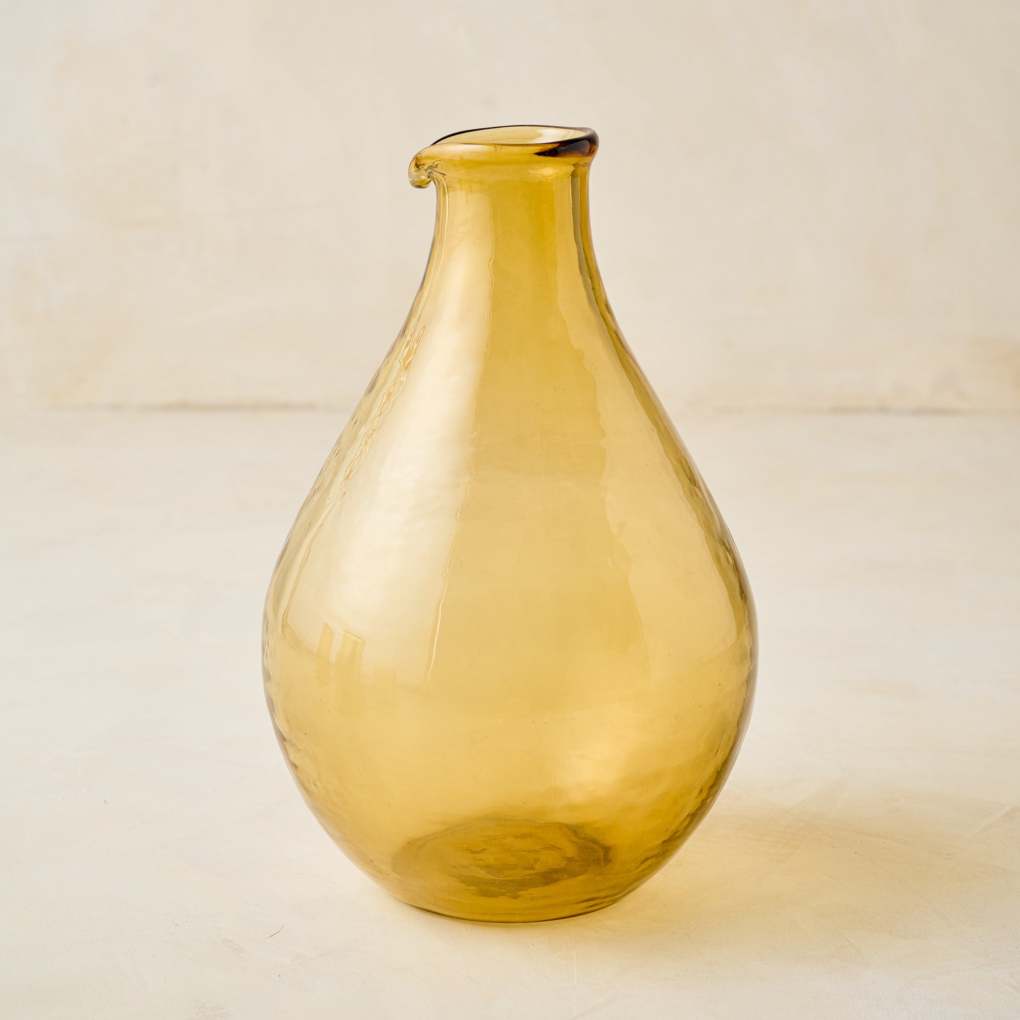 Amber Rustic Glass Globe Carafe On sale for $16.00, discounted from $40.00