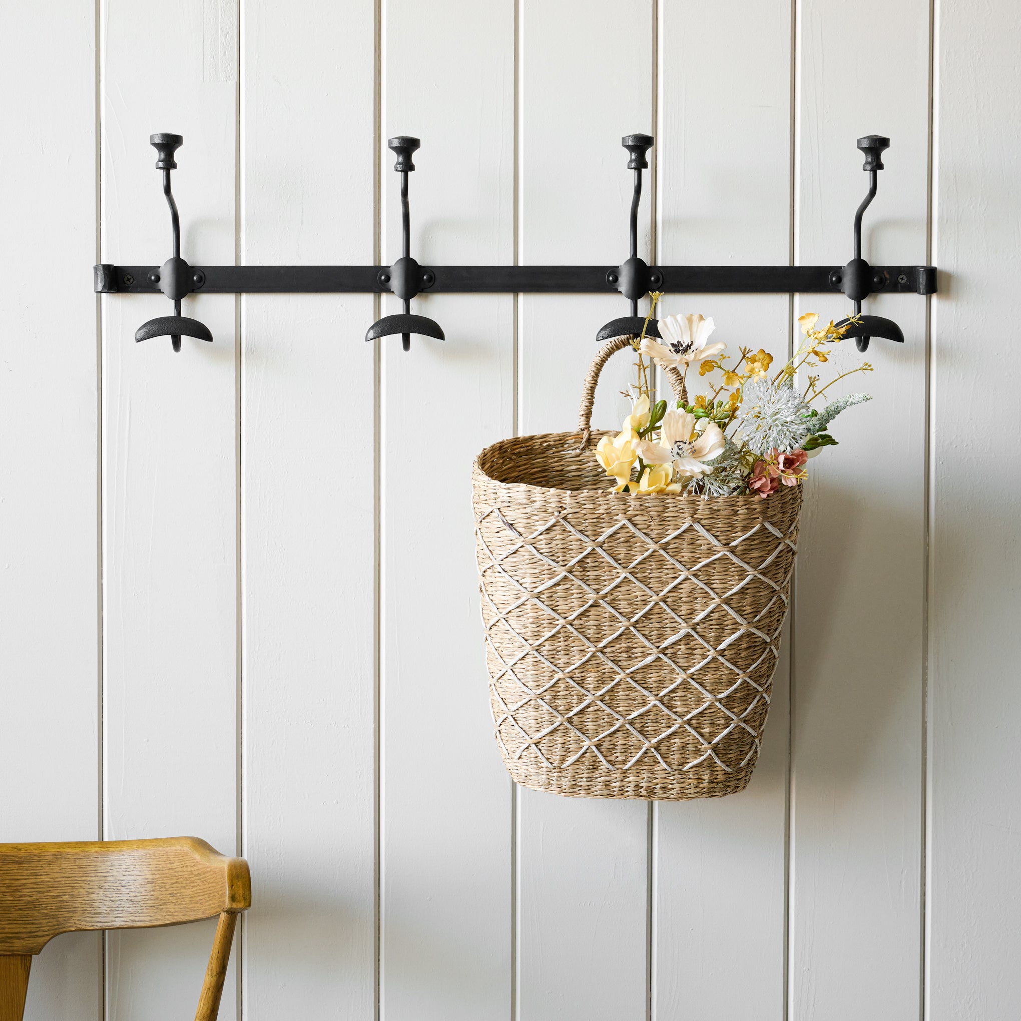 Long duke metal wall hook pictured with wicker basket hanging from one hook. Items range from $20.00 to $58.00