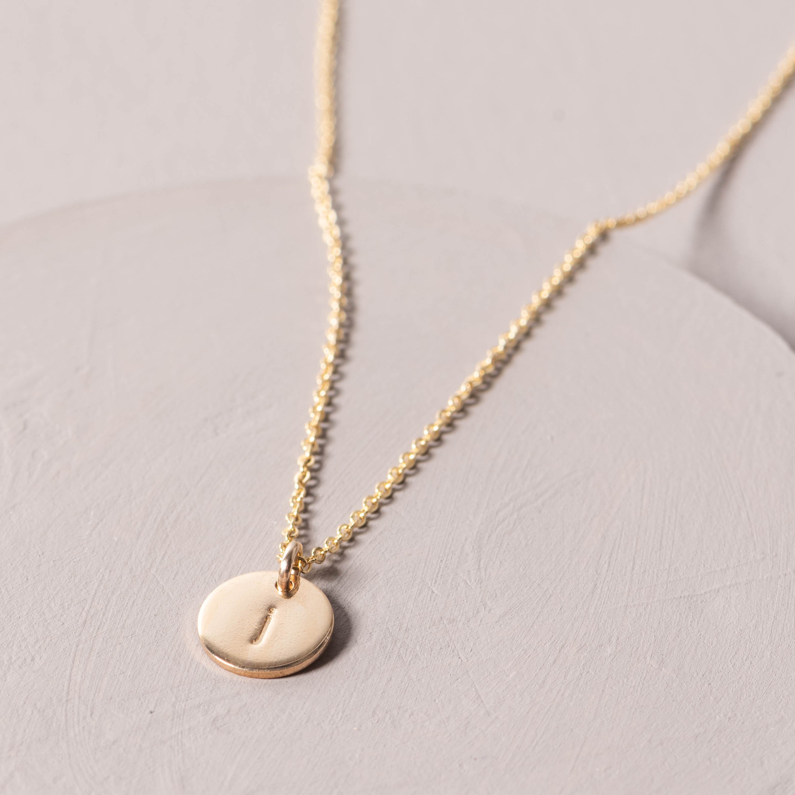 magnolia gold initial disc necklace