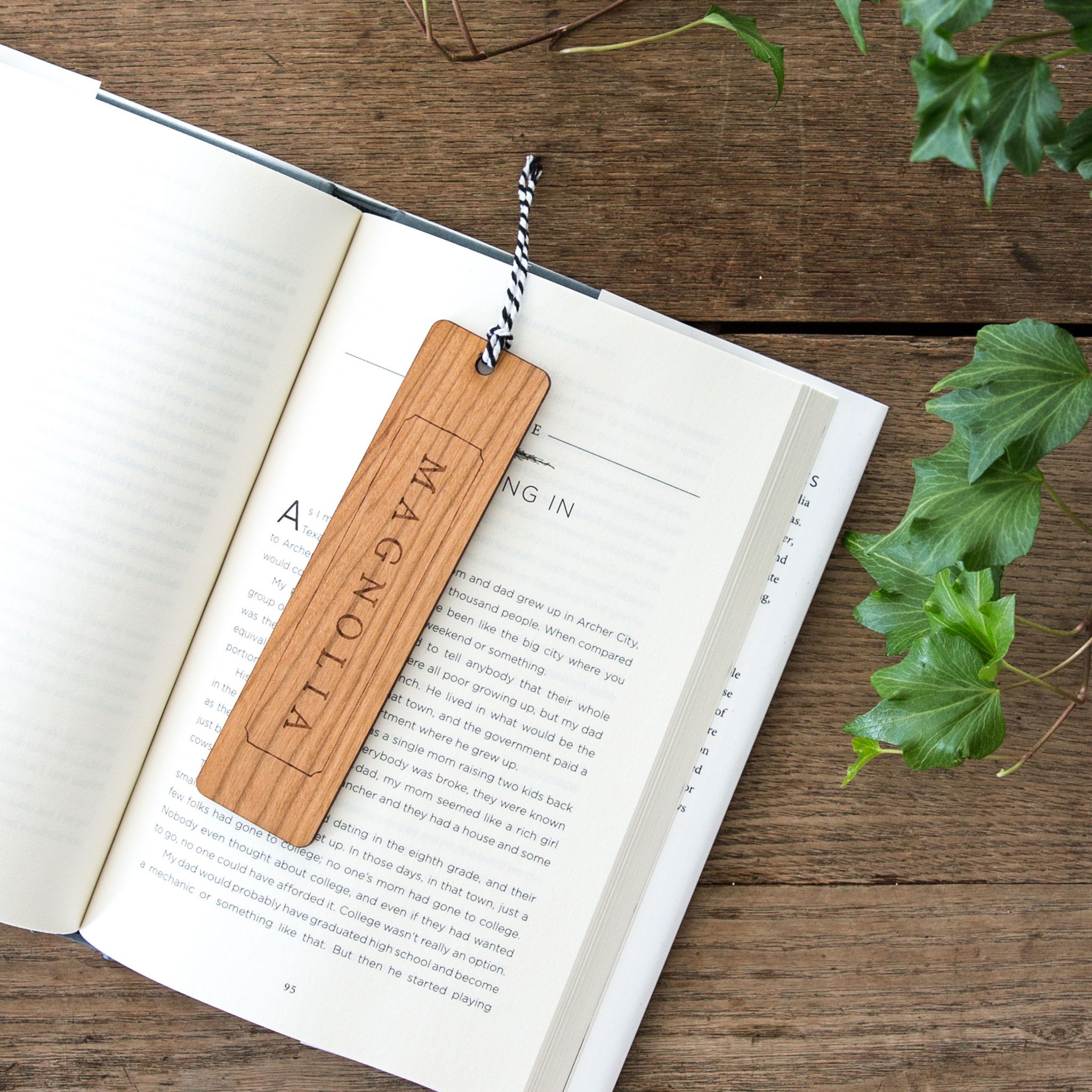 wooden bookmark with magnolia logo