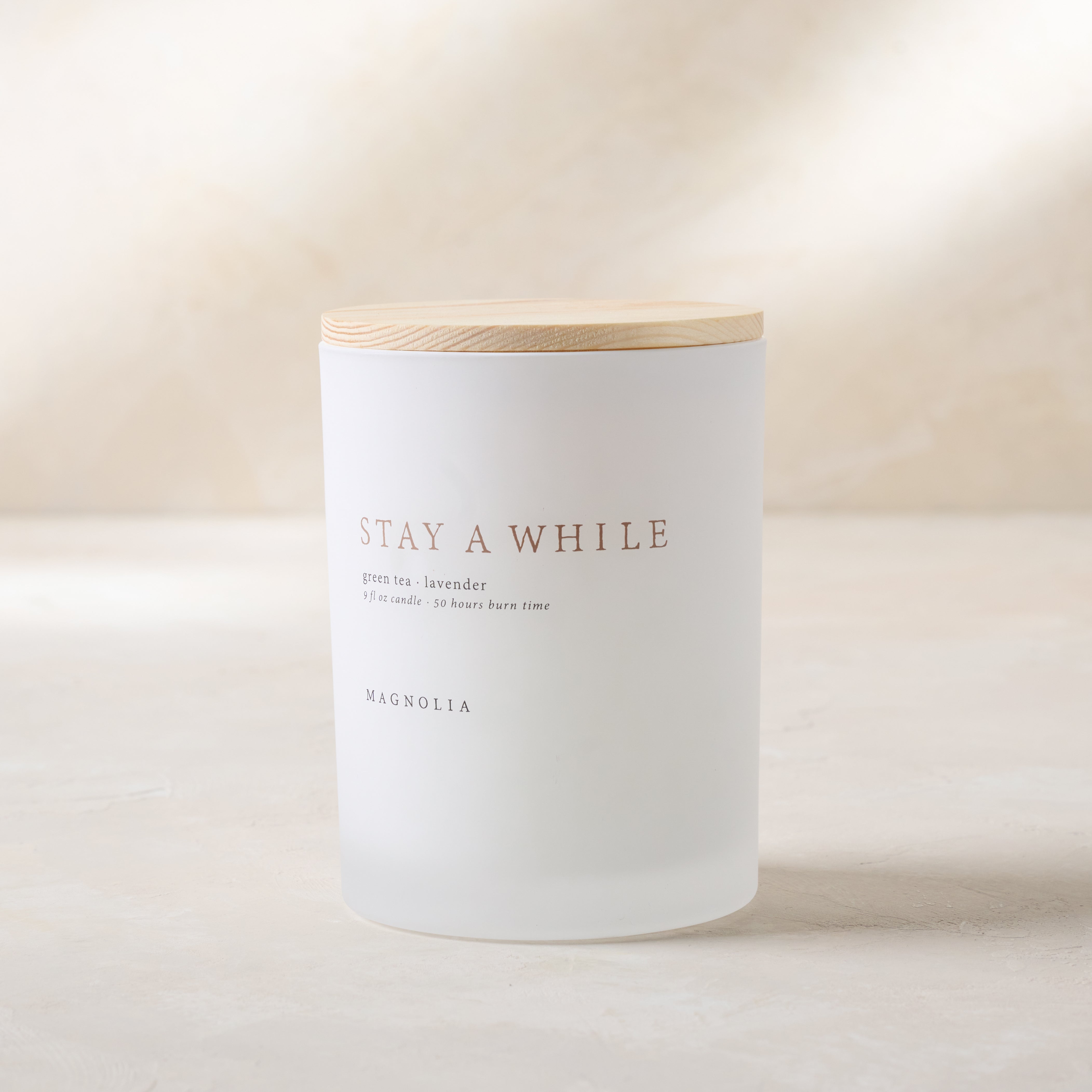 magnolia stay a while candle with wood lid notes scents of green tea and lavender Items range from $30.00 to $58.00