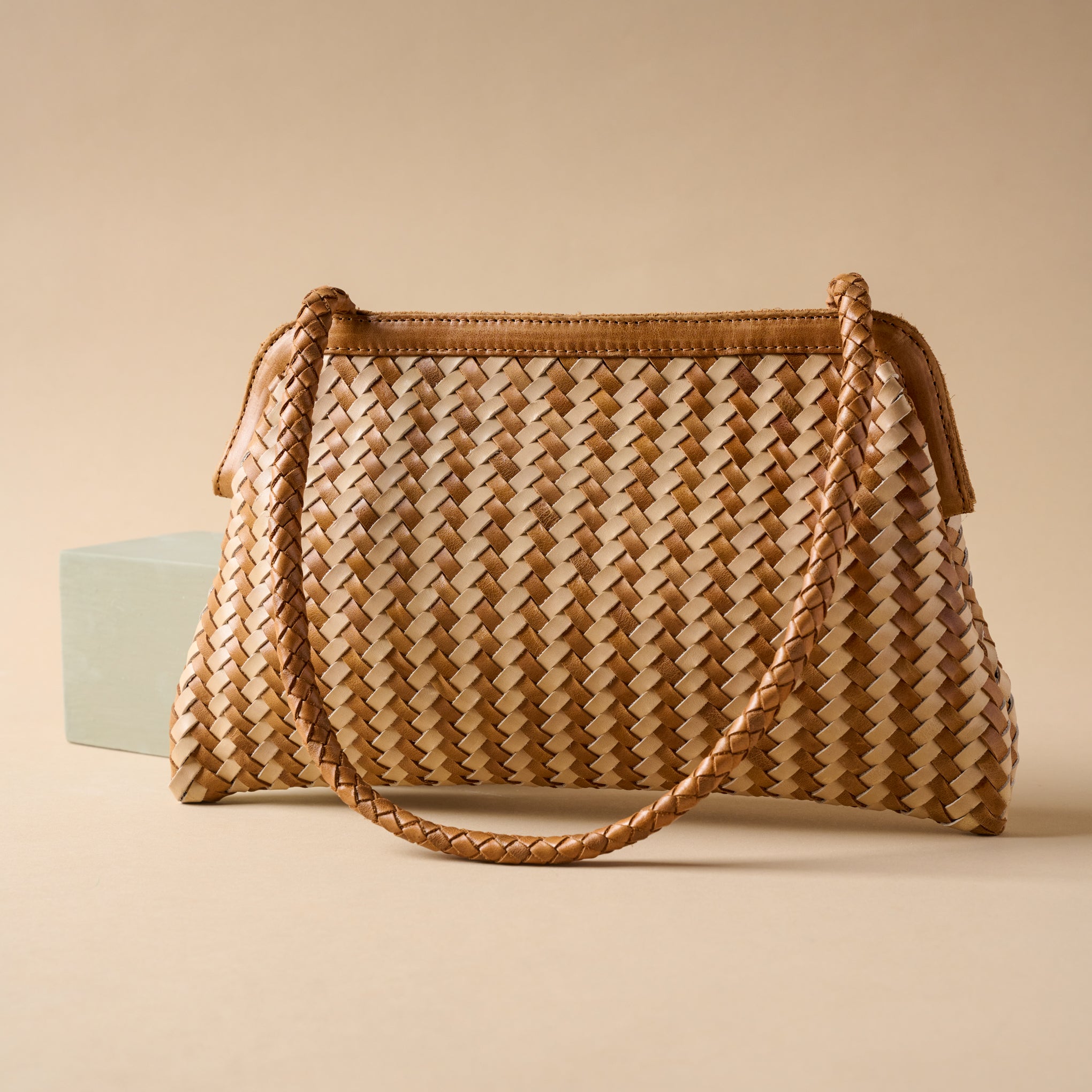 Coco stripe shoulder bag with herringbone pattern.  $200.00