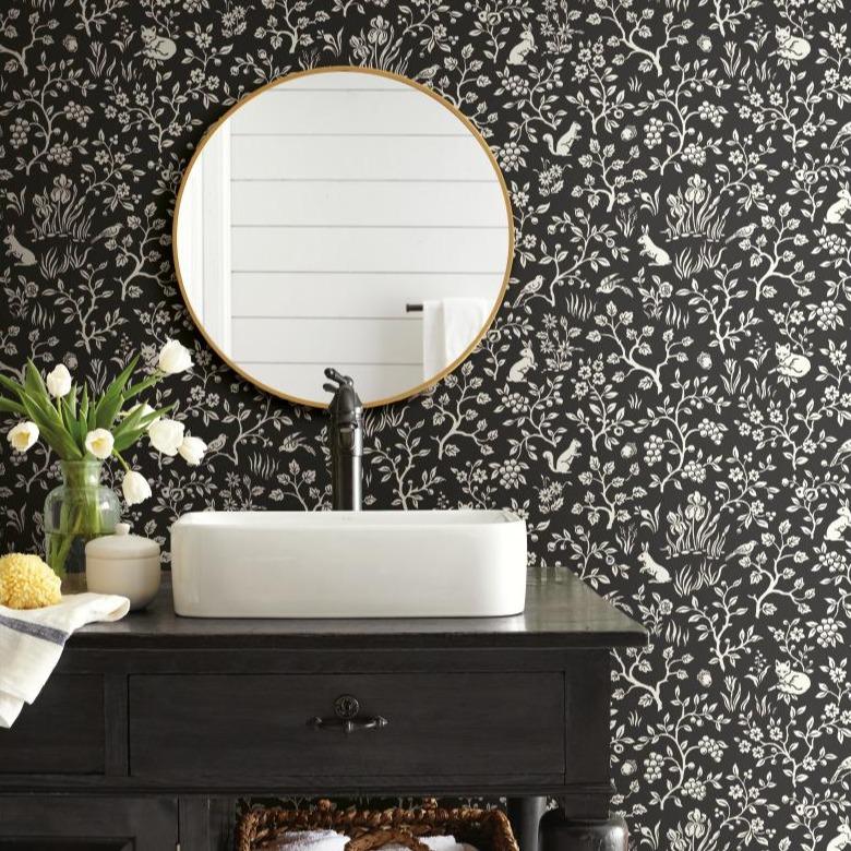 black and white woodland sketch patterned wallpaper  Items range from $120.00 to $130.00