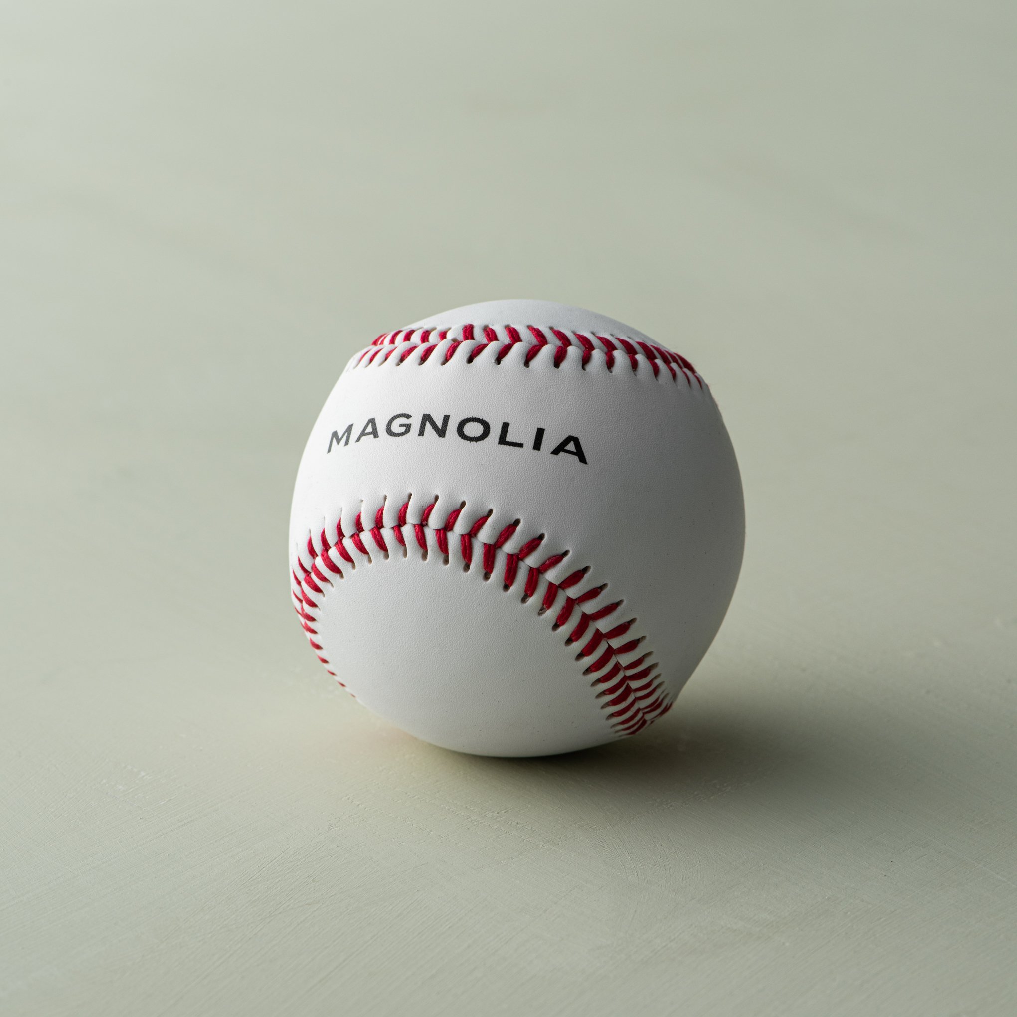 Magnolia White Leather Baseball$8.00