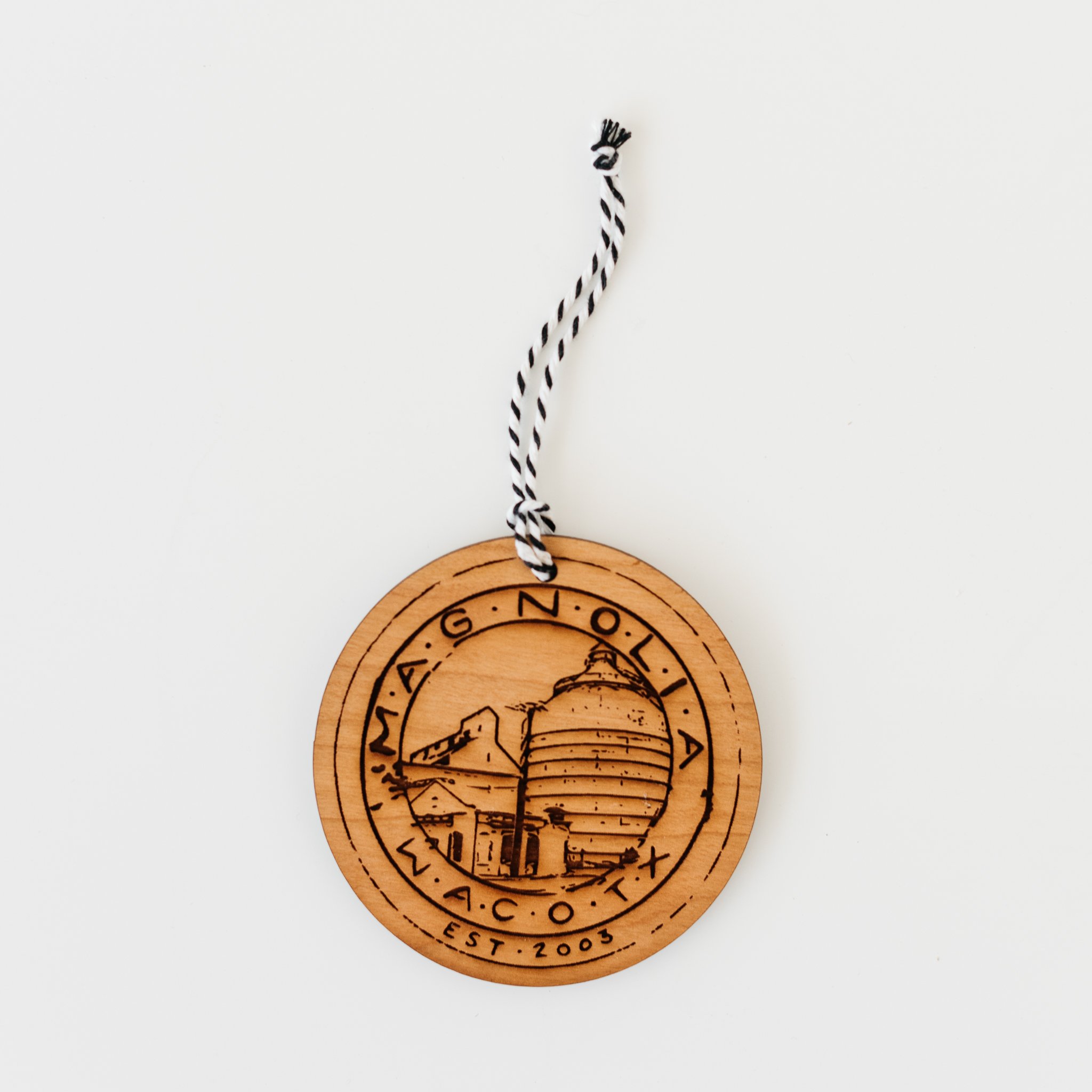 wooden laser-engraved christmas ornament of the magnolia silos seal