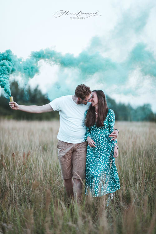 /_vercel/image?url=/Happy+smiling+couple+with+the+smoke+in+hands+is+walking+through+the+high+grass.&w=1536&q=100