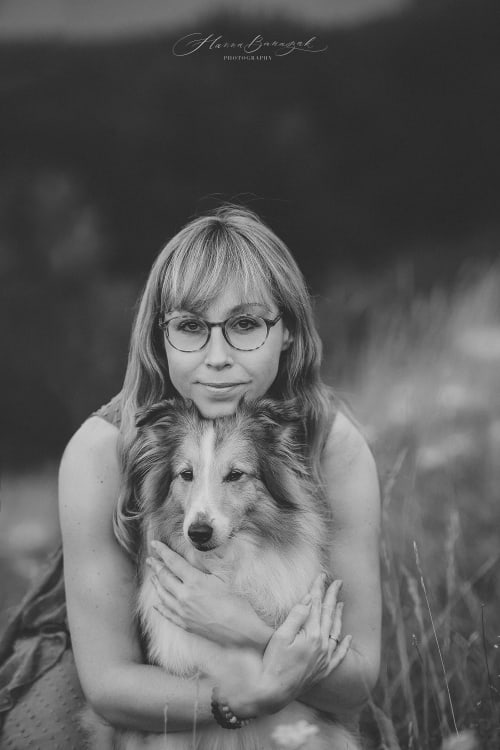 /_vercel/image?url=/Woman+is+holding+with+love+her++border+collie.&w=1536&q=100