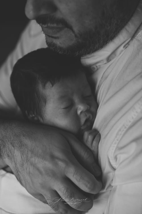 /_vercel/image?url=/Baby+hugged+by+his+Daddy.&w=1536&q=100