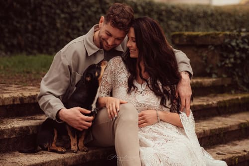 /_vercel/image?url=/Pregnant+woman+with+her+husband+and+dog.&w=1536&q=100