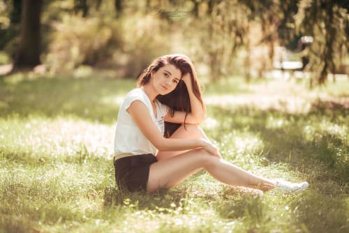 /_vercel/image?url=/Girl+sitting+on+the+grass+in+sunny+day.&w=1536&q=100