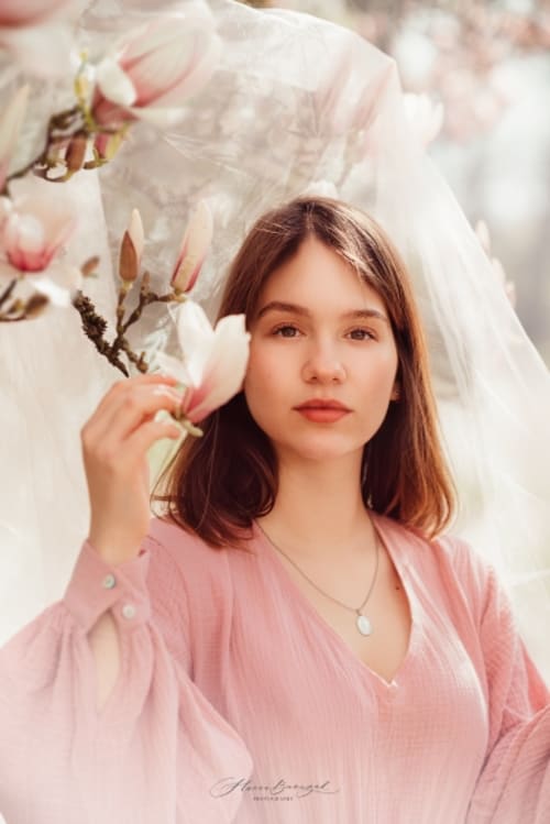 /_vercel/image?url=/Portrait+of+woman+during+spring.&w=1536&q=100