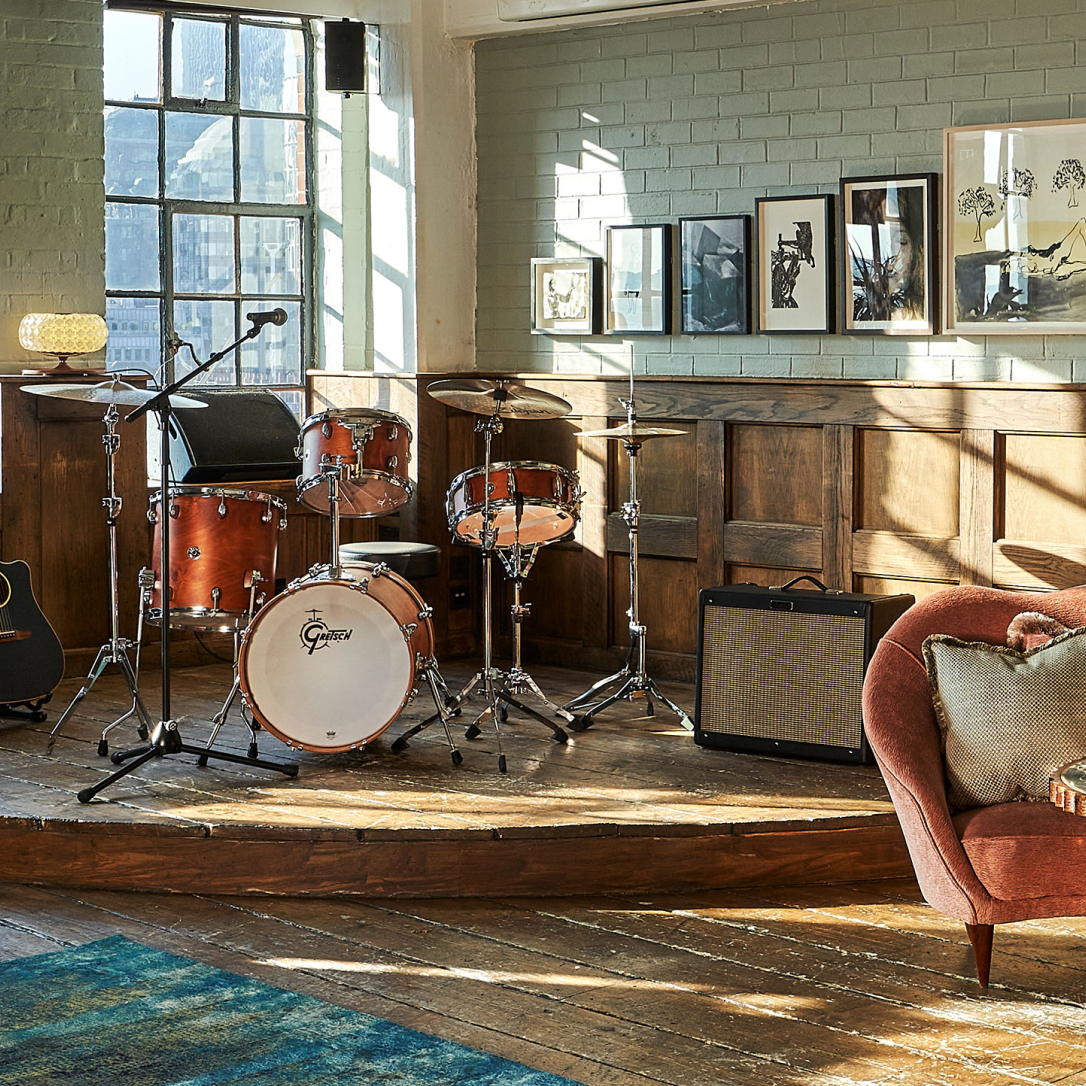 A drumkit on a stage.