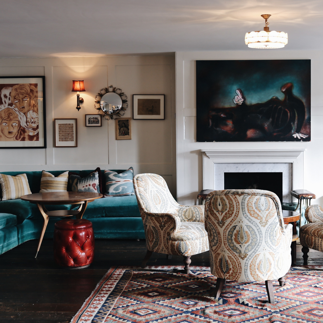 A corner sofa with cushions on it.