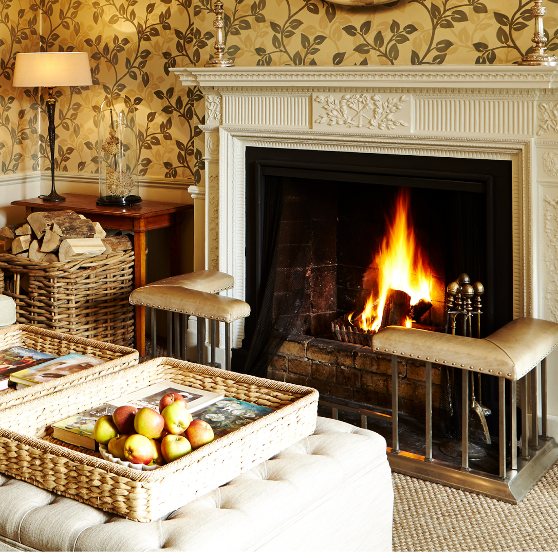 A log fire burning in a fireplace.