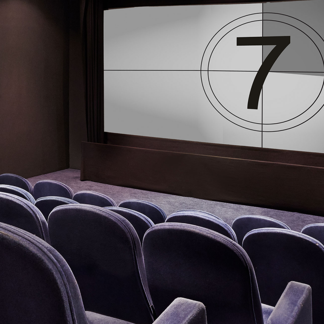 Cinema seating and a screen.