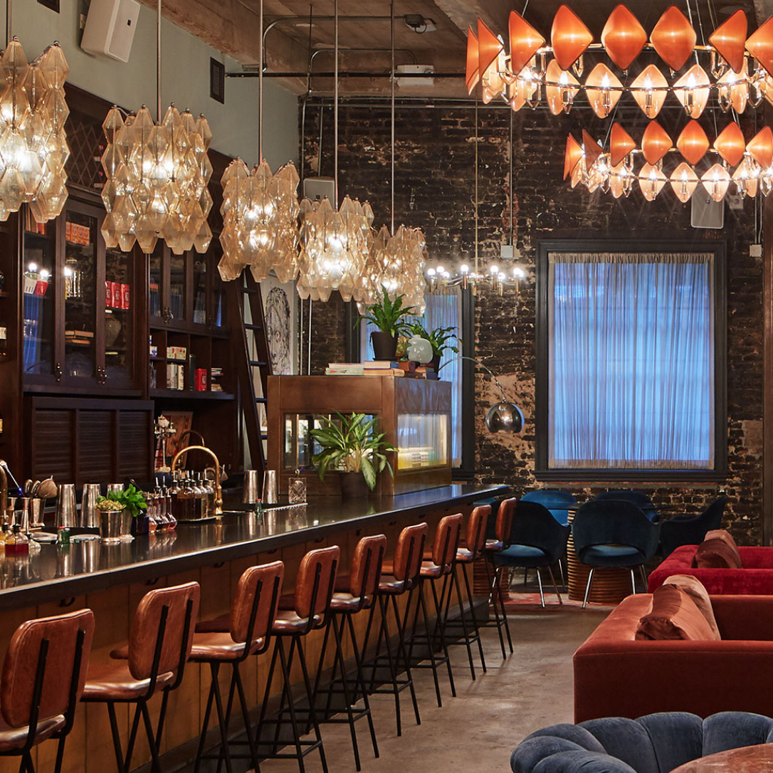 A long bar and relaxed seating areas.