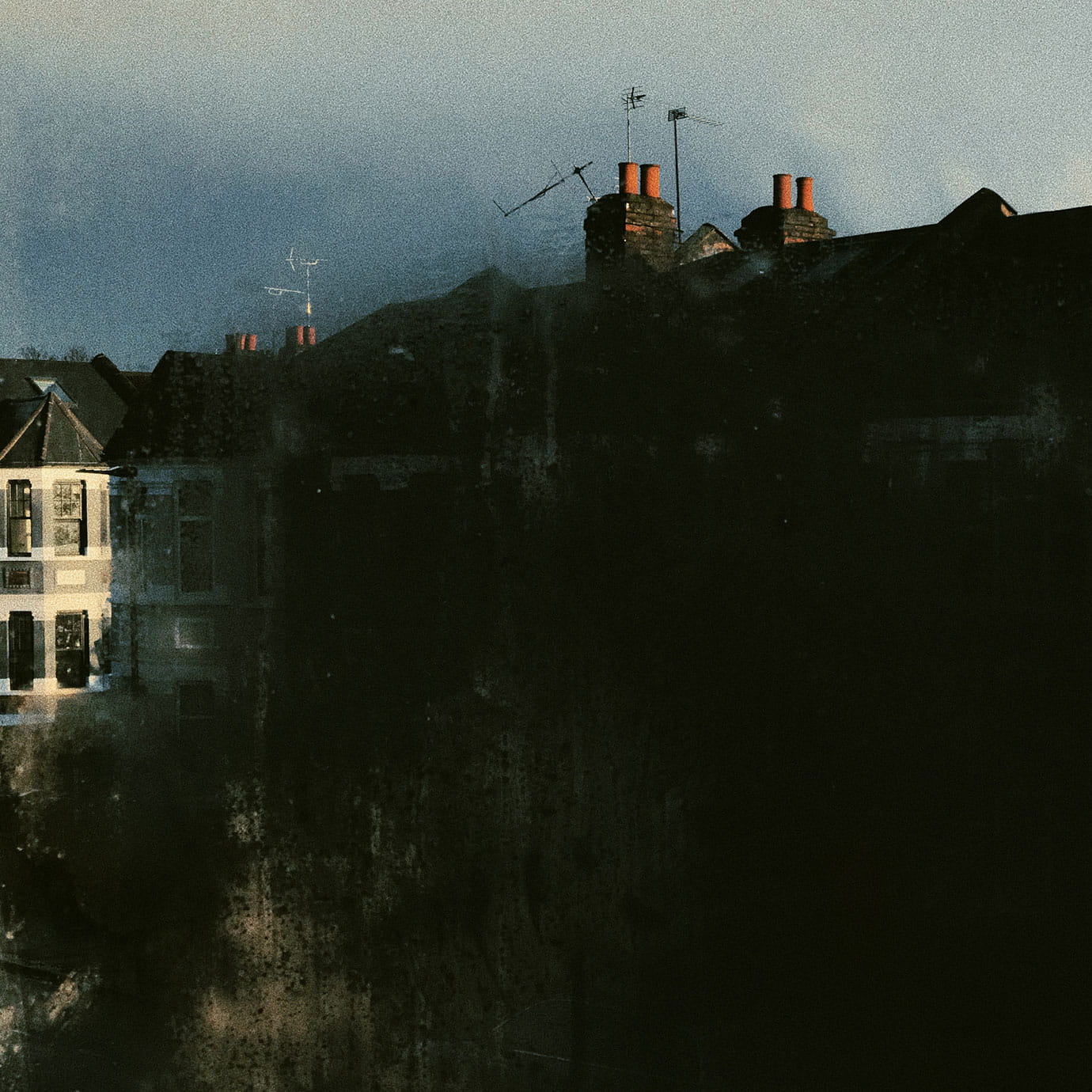 Looking out on a street in the dark morning.