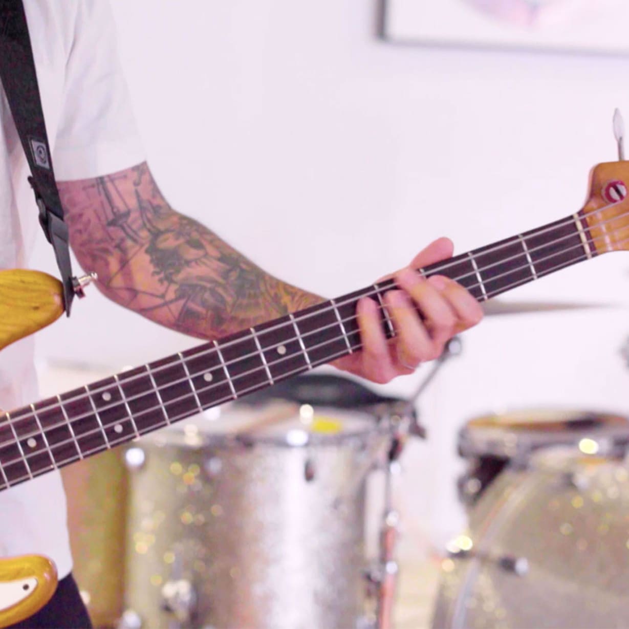 man playing electric guitar