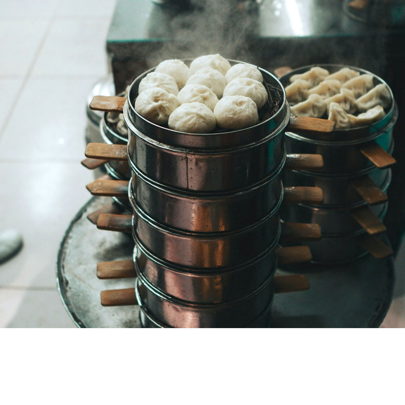 Dim sum dumplings on trays.