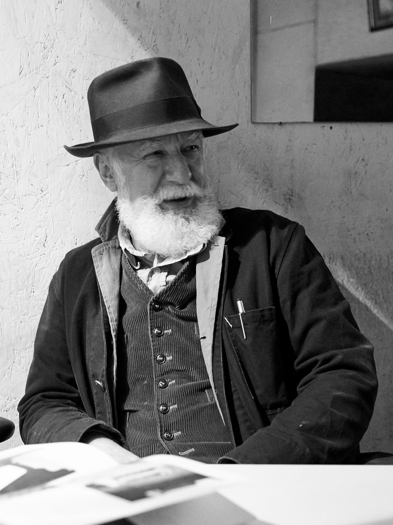 An old man wearing a hat.